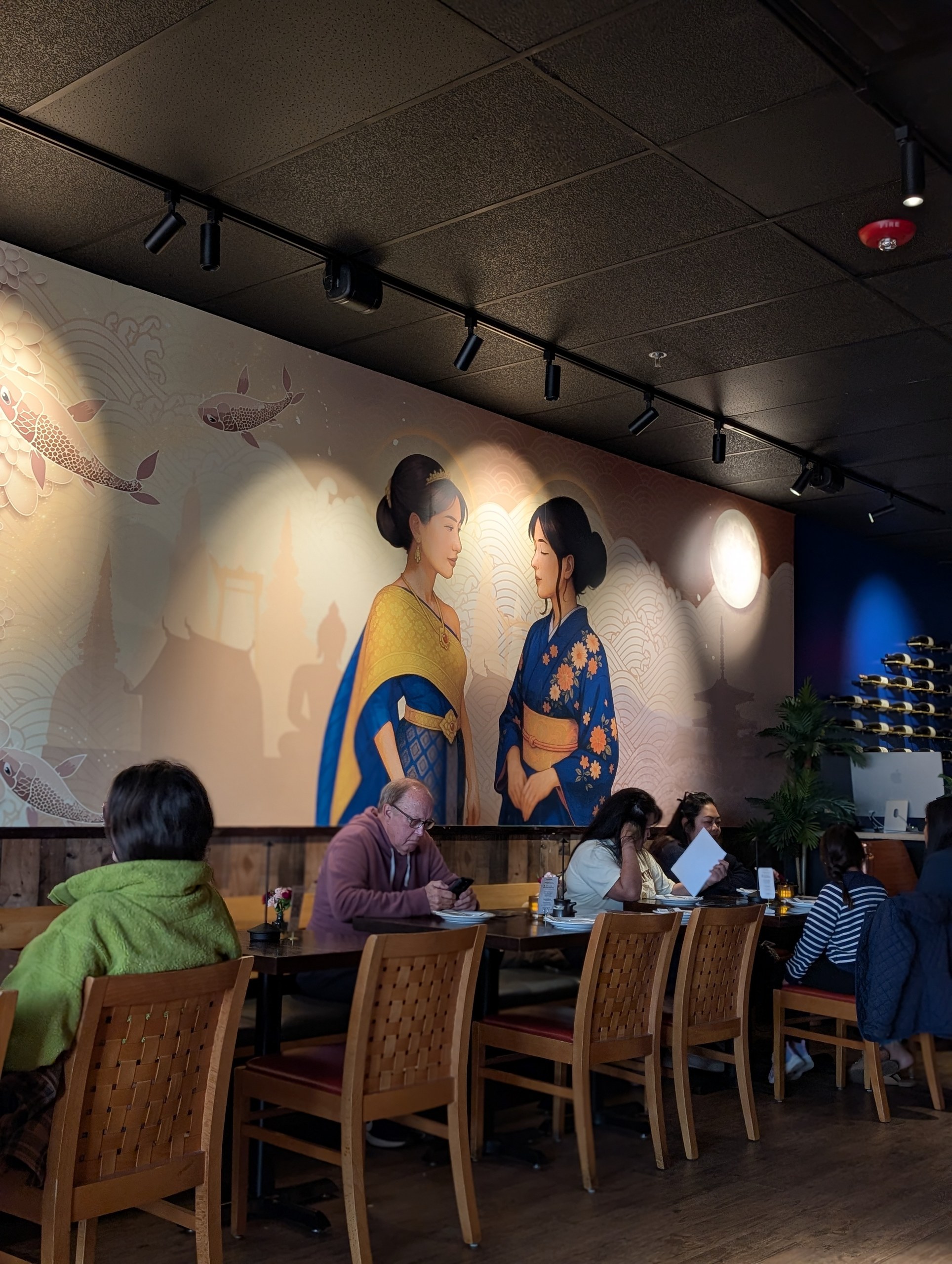 Dining room with mural at Sushi Plus Thai by Sensei in Palatine, Illinois