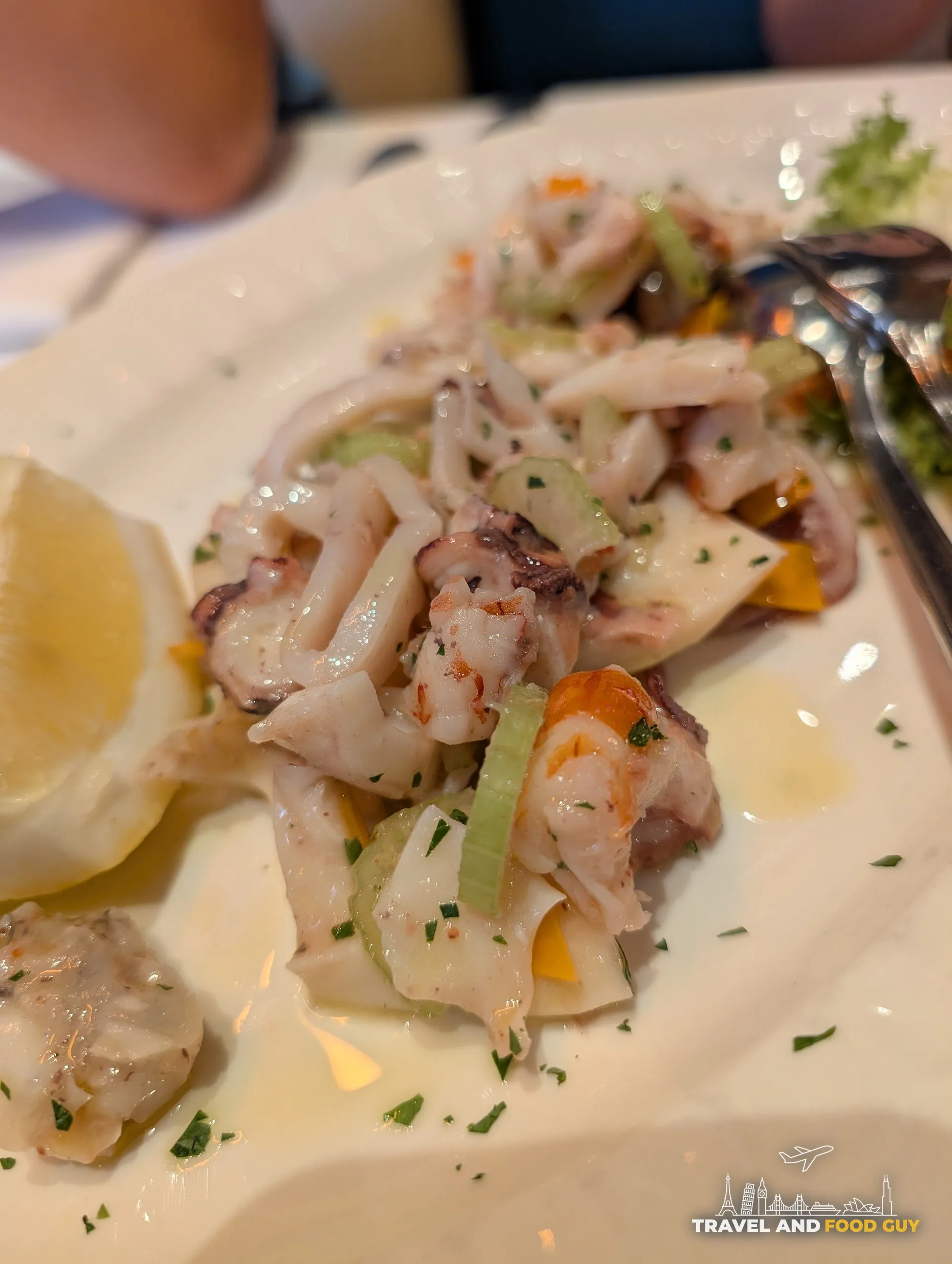 Plated seafood antipasto with octopus, calamari, shrimp at Alla Rampa dei Gracchi, Rome