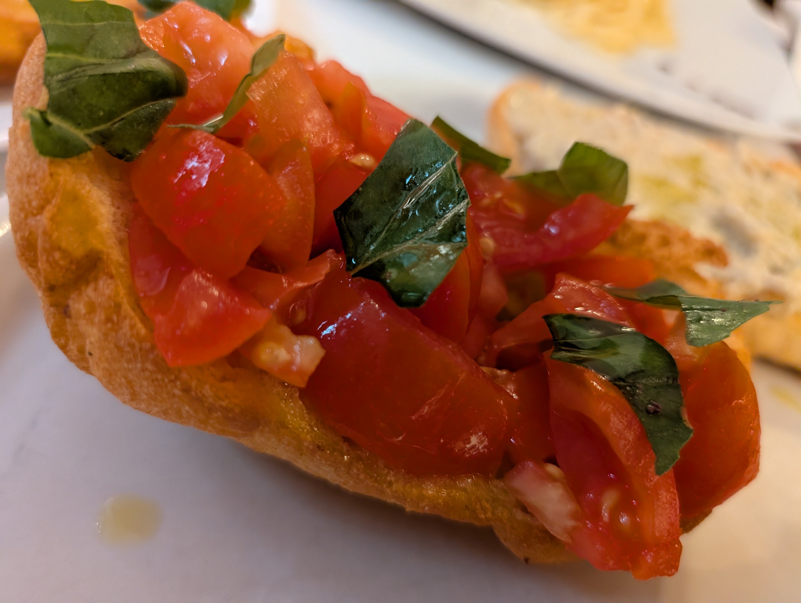 Classic bruschetta al pomodoro at Er Baretto in Monti, Rome