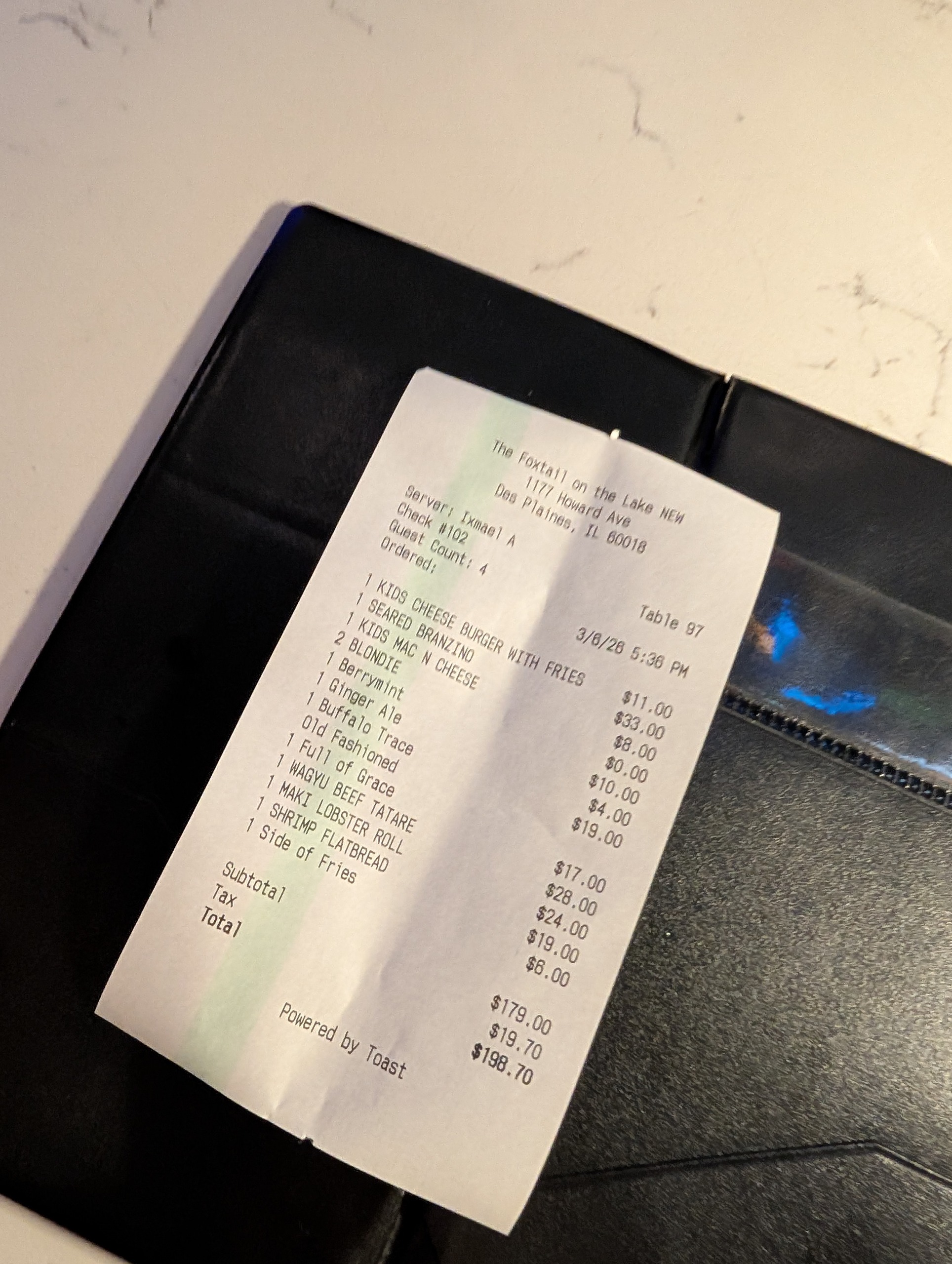 Itemized check at The Foxtail on the Lake, 198.70 total for four guests