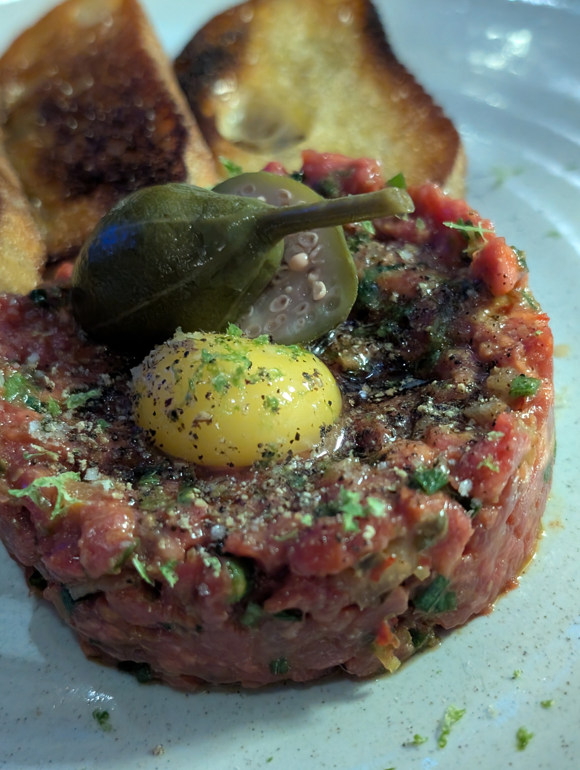 Wagyu beef tartare with quail yolk and toast points at The Foxtail on the Lake