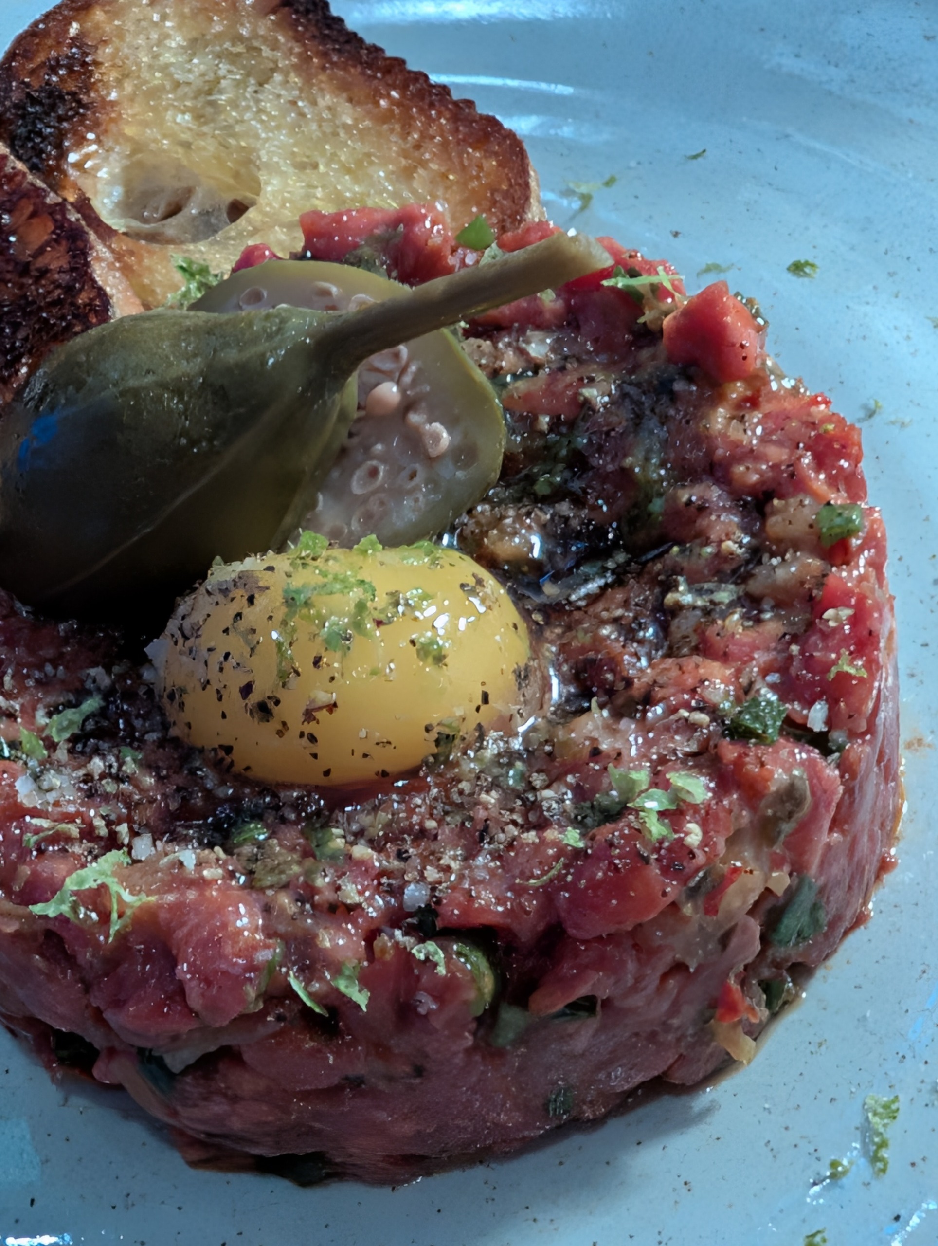 Wagyu tartare quail yolk close up