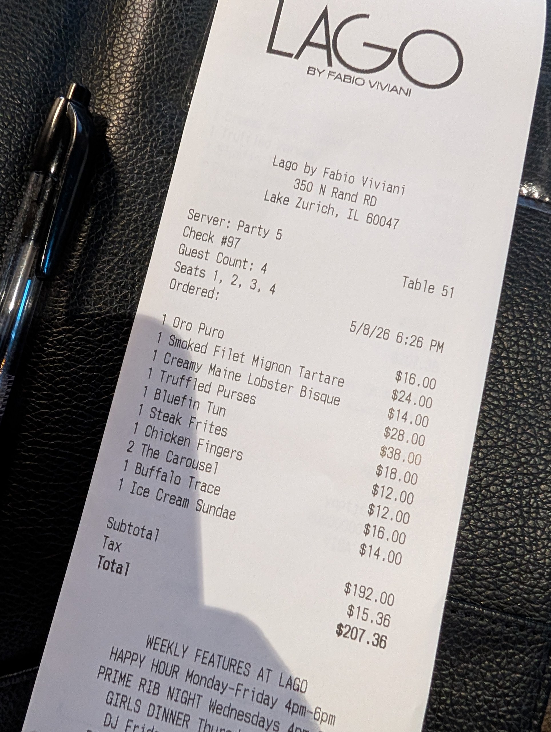 Receipt from LAGO by Fabio Viviani in Lake Zurich showing the meal for four