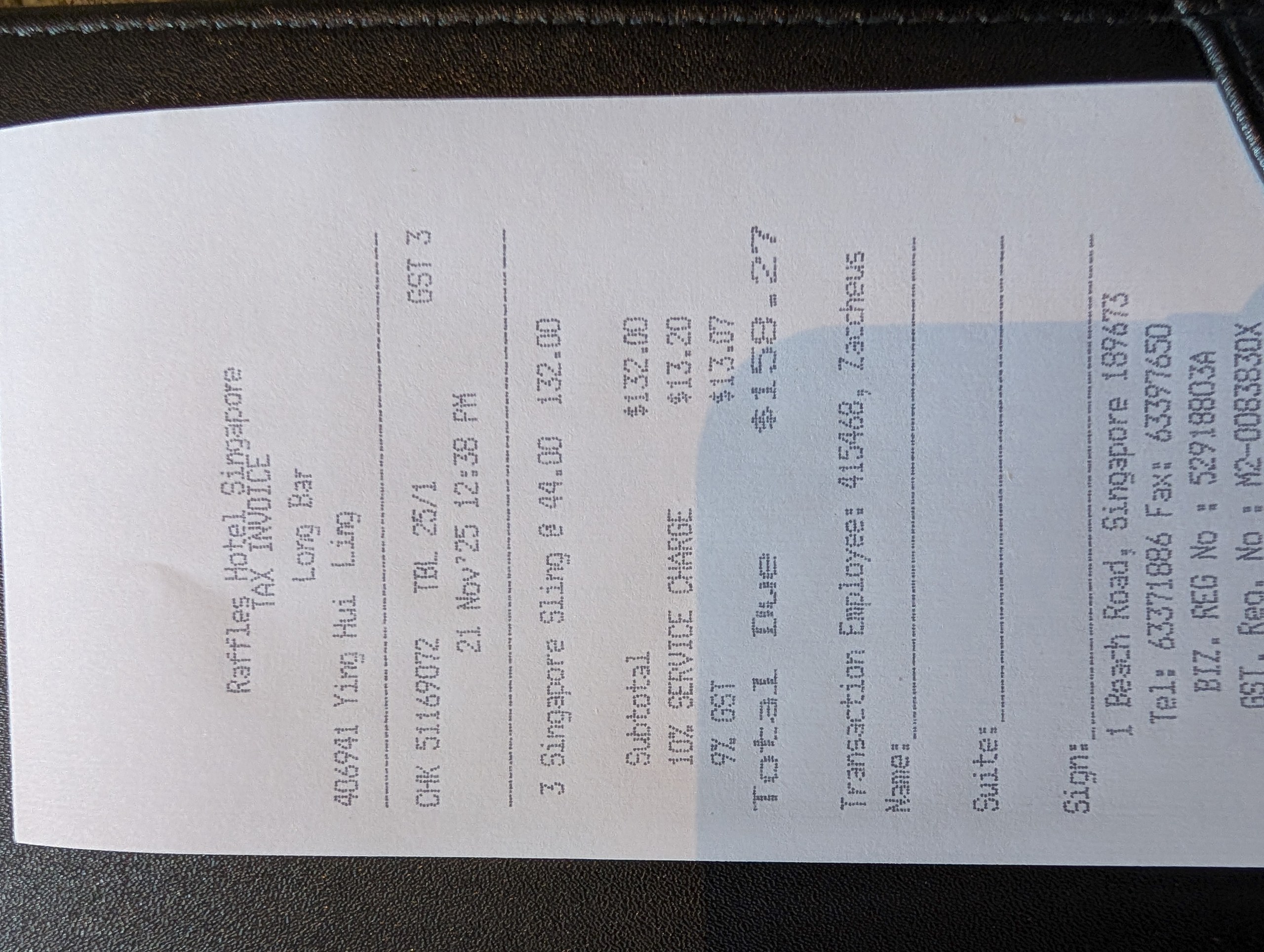 Receipt from Long Bar at Raffles Hotel Singapore showing three Singapore Slings totaling S$159.27