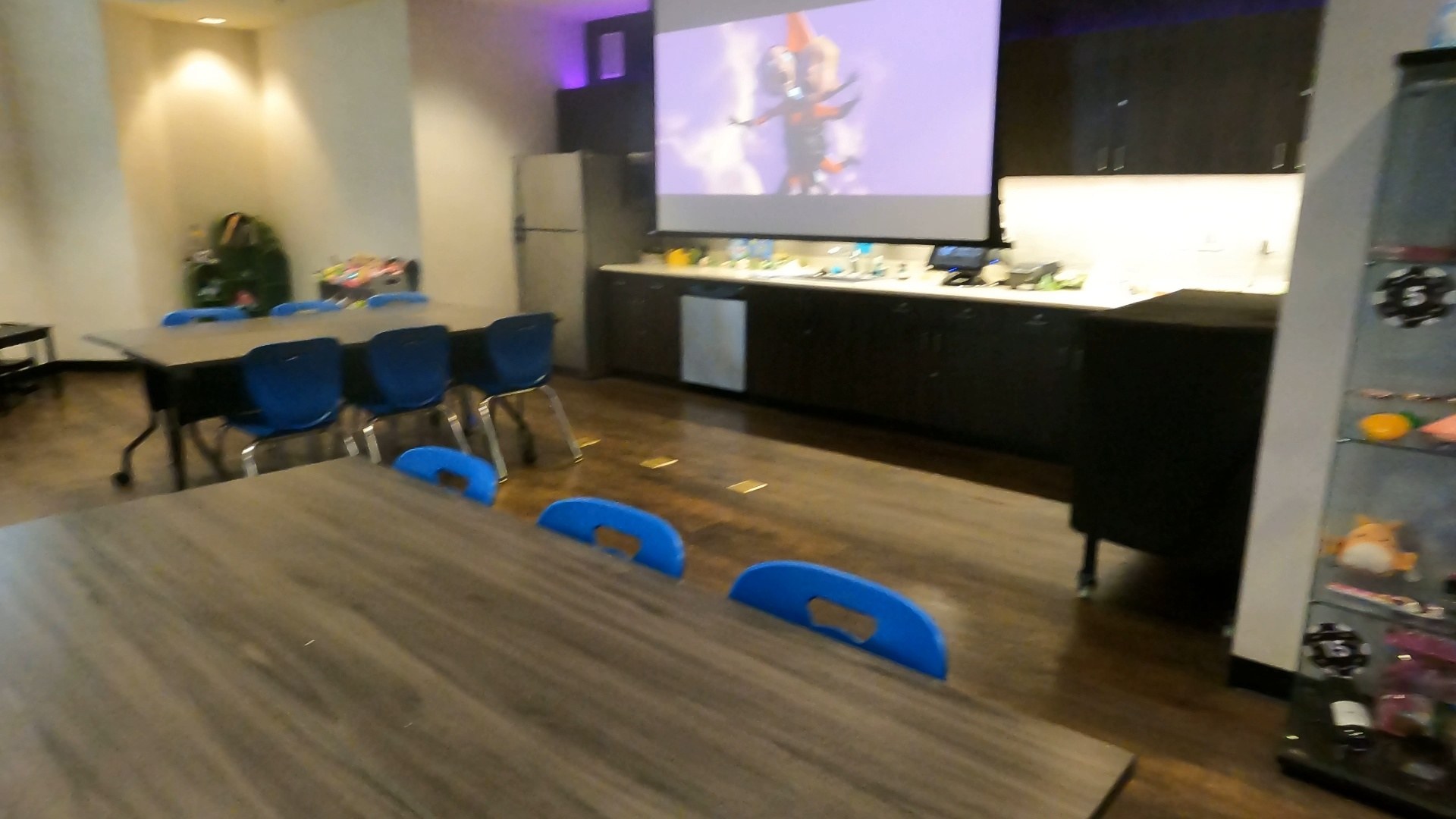 Kids movie projection on a large screen in the activities room at the Marriott Grand Chateau Las Vegas