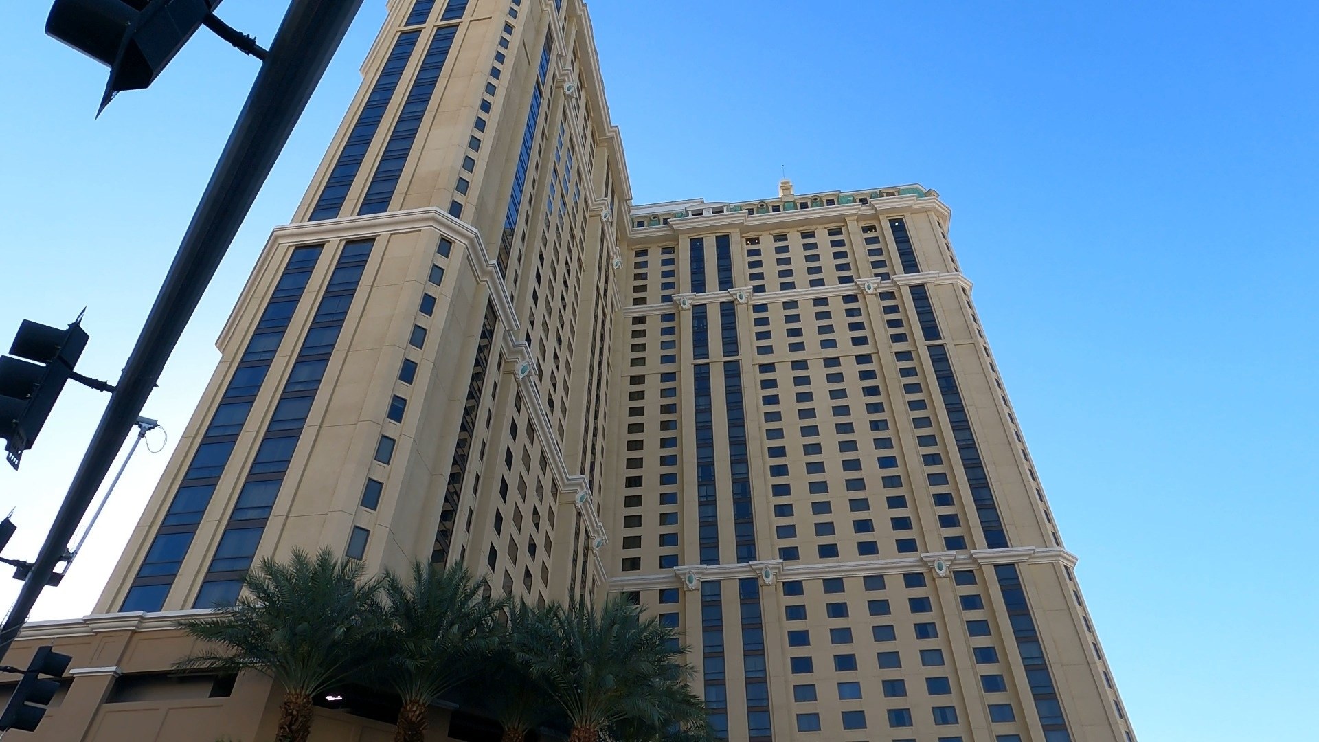 The Marriott Grand Chateau tower from the sidewalk looking up, the suite-only Vacation Club property half a block off the Las Vegas Strip