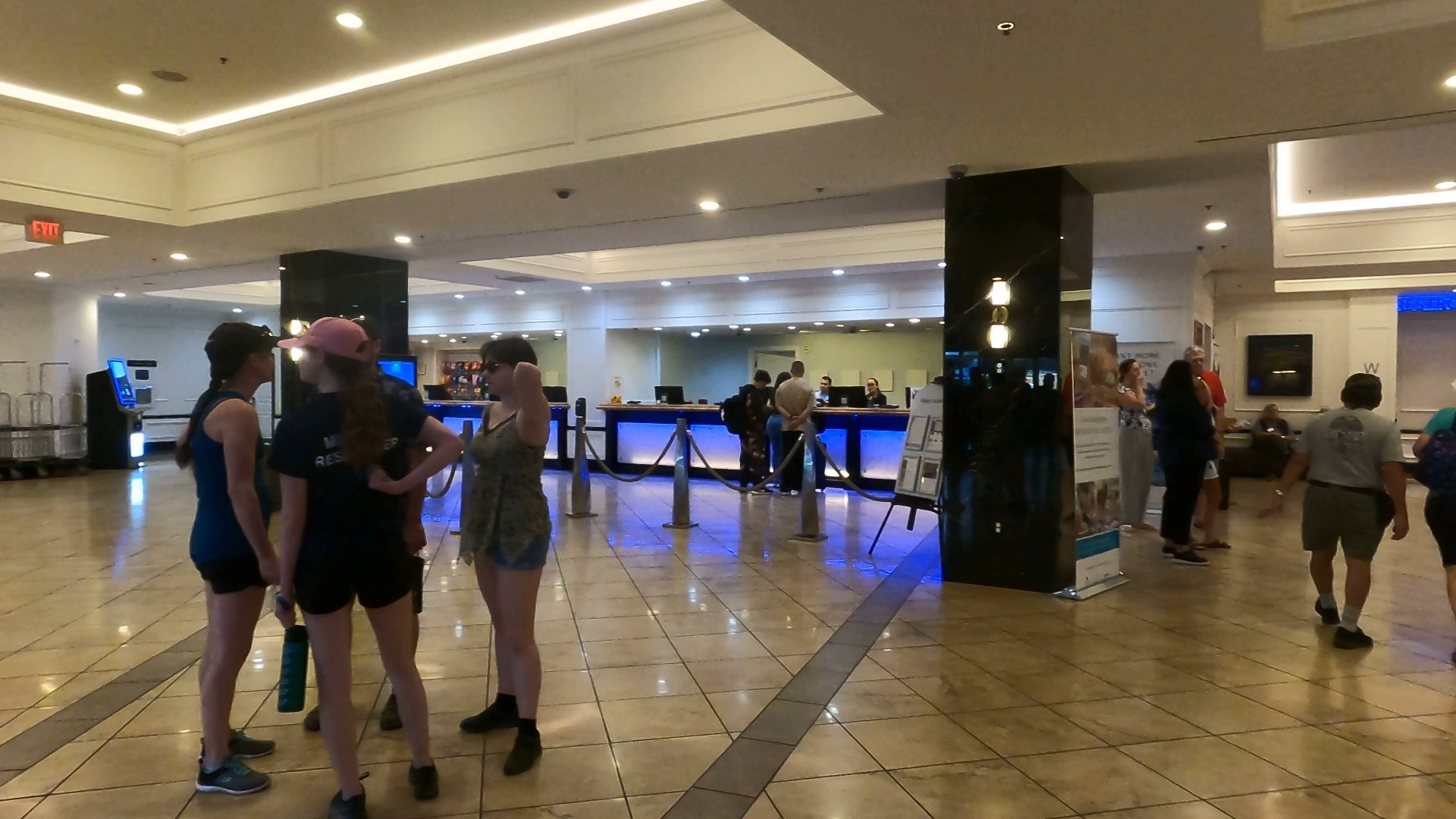 Front desk check-in counter at the Marriott Grand Chateau Las Vegas with guests queuing