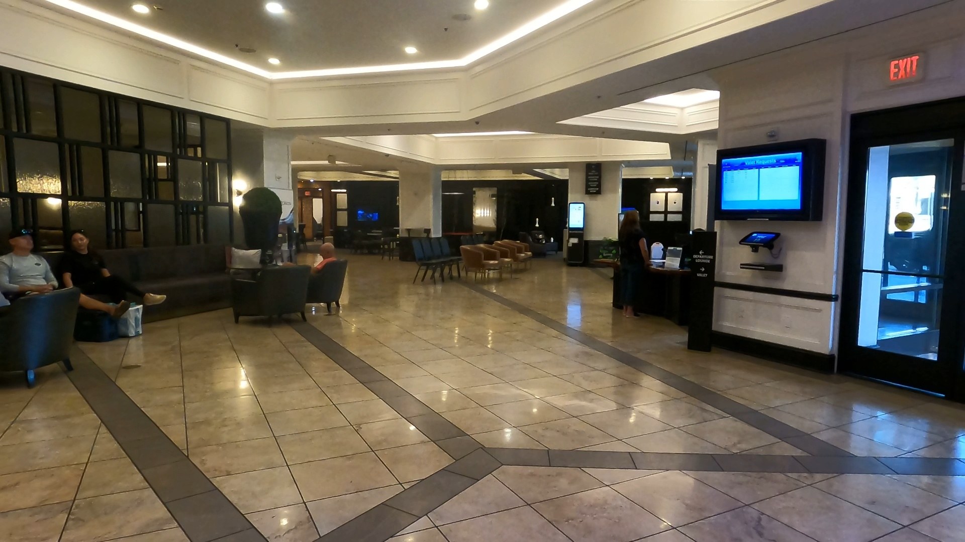 Open marble-floored lobby seating area at the Marriott Grand Chateau Las Vegas