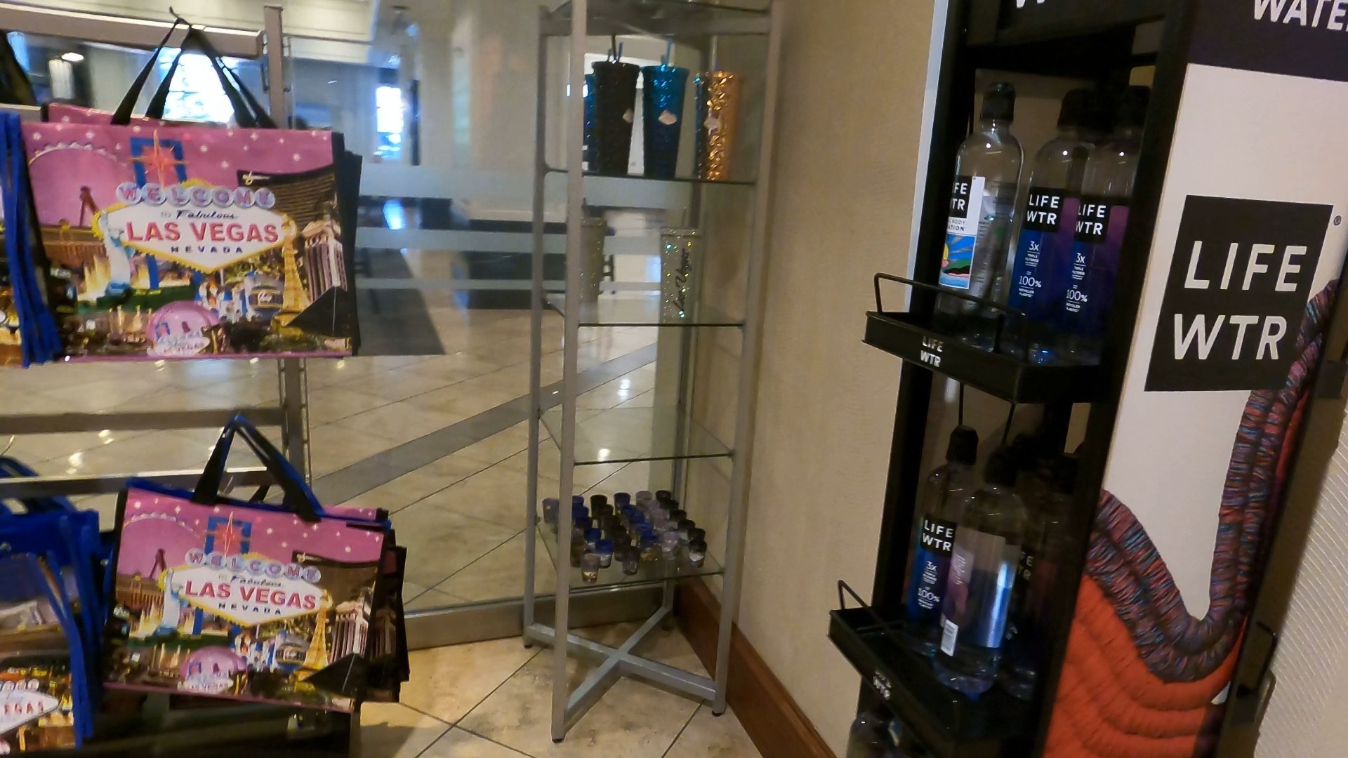 Las Vegas souvenir bags and LIFEWTR bottles on display at the Marketplace pantry