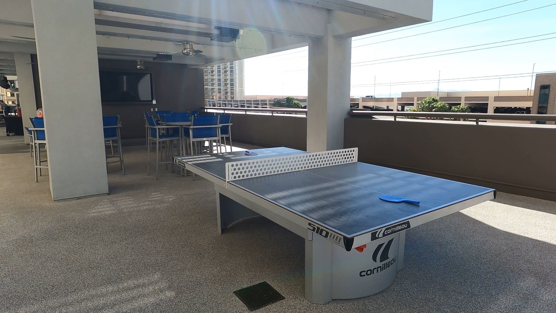 Table tennis on the pool deck at the Marriott Grand Chateau Las Vegas with high-top tables