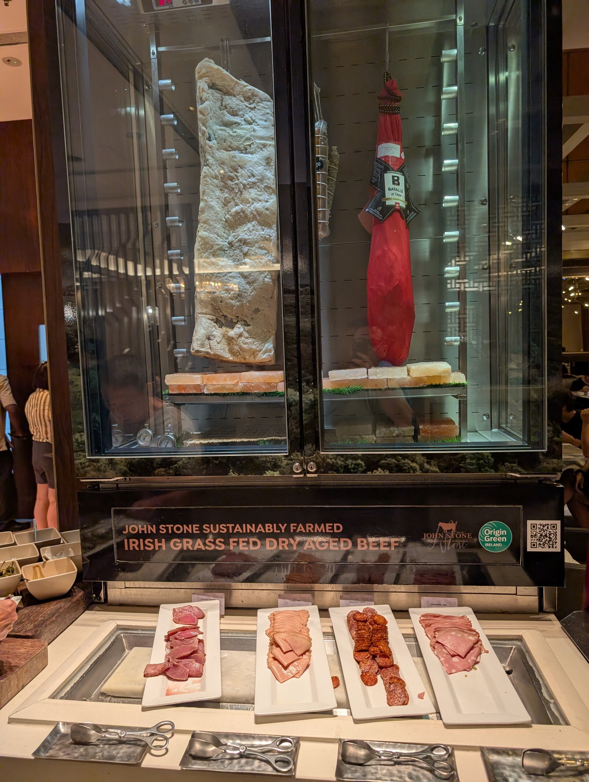 Glass aging cabinet of John Stone dry-aged Irish grass-fed beef at Crossroads, Singapore Marriott Tang Plaza
