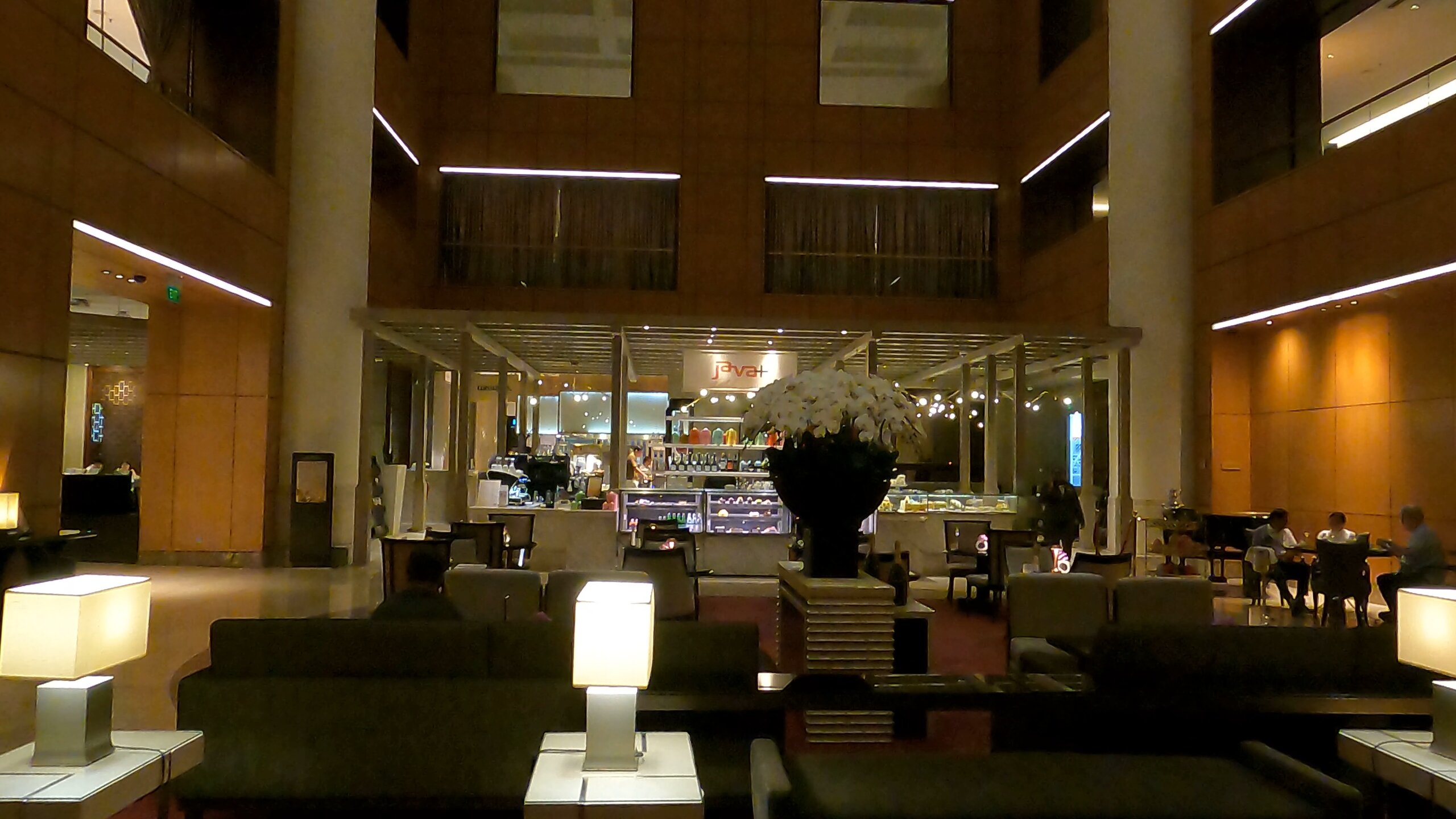 Lobby atrium with lounge seating and Java cafe in the Singapore Marriott Tang Plaza