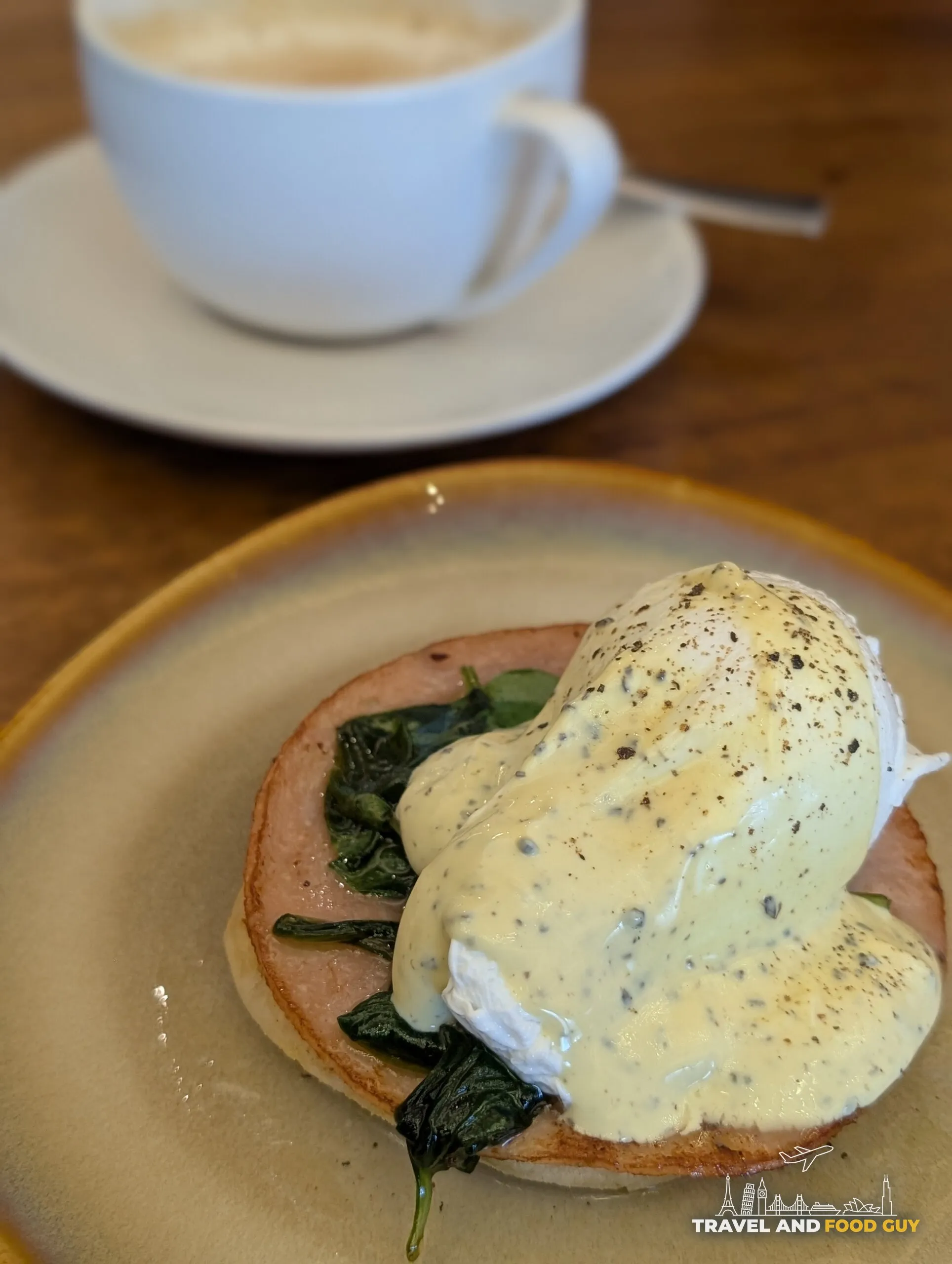 Eggs benedict over spinach with coffee in the M Club lounge at the Singapore Marriott Tang Plaza
