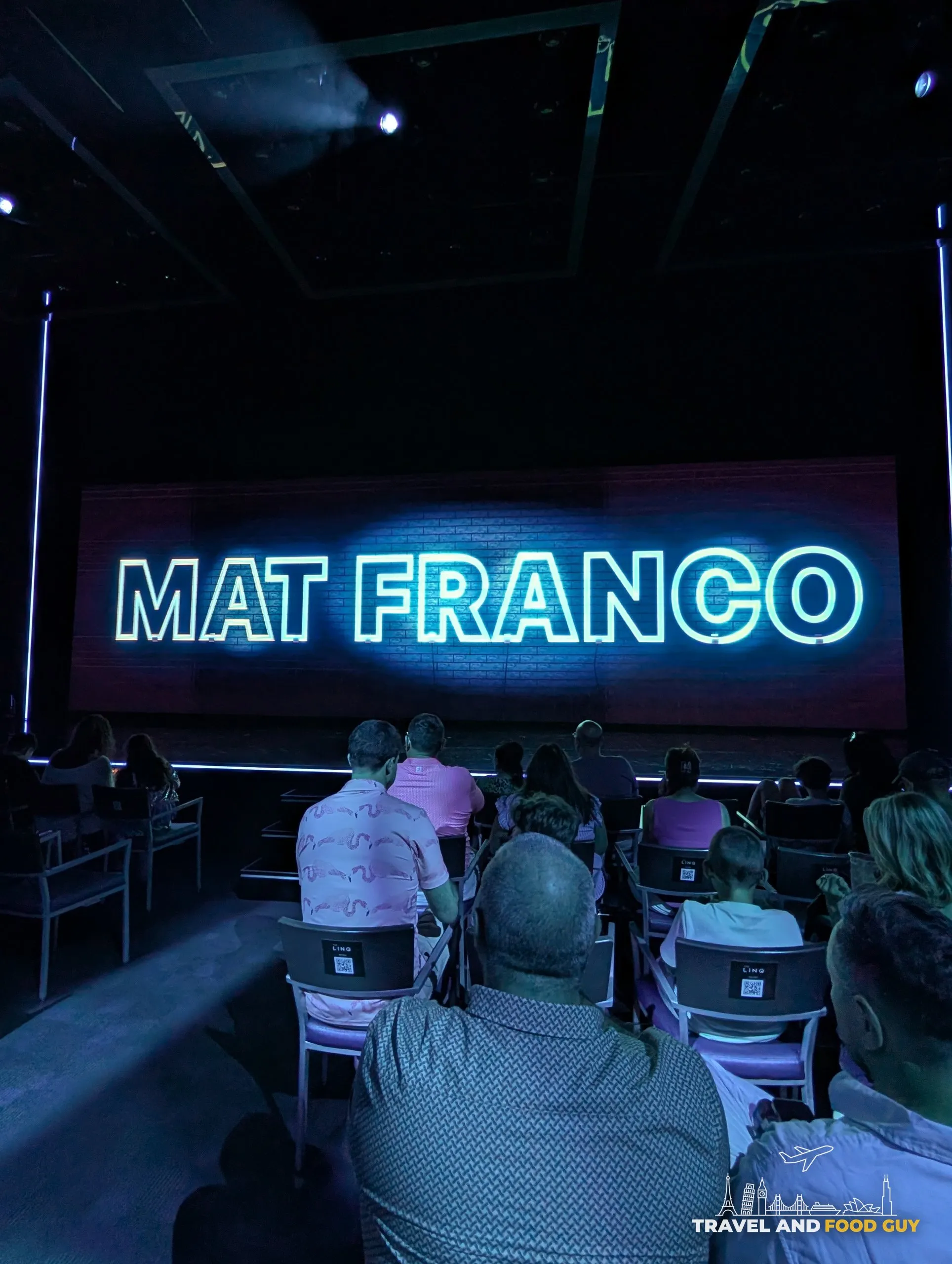 Mat Franco neon sign on the stage backdrop at The Linq before the show begins