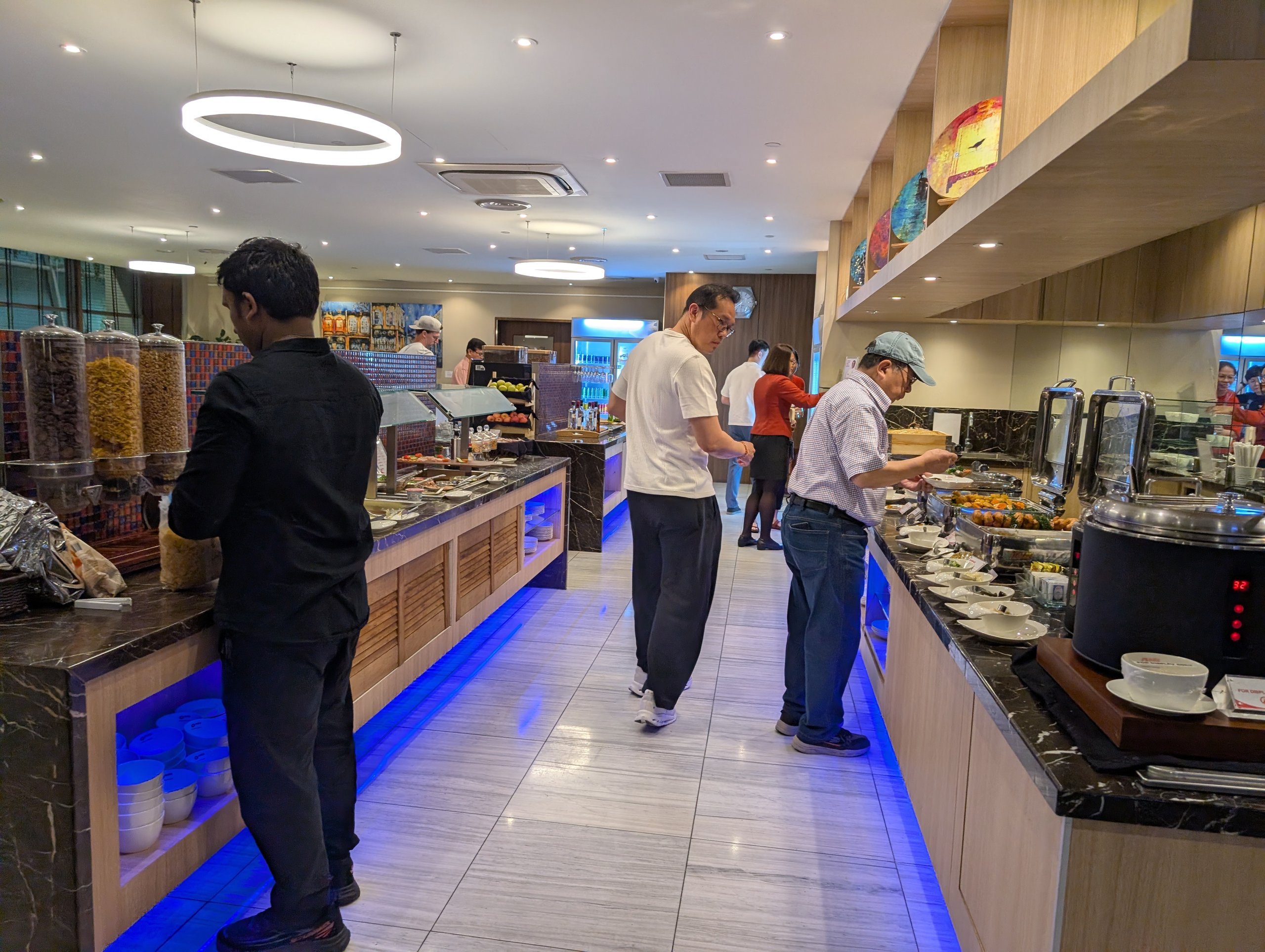 Wide view of the buffet line at the SATS Premier Lounge in Singapore Changi Terminal 2