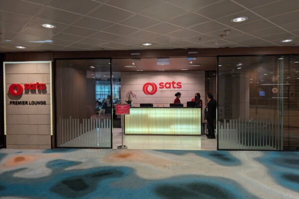 Entrance and reception desk at the SATS Premier Lounge in Changi Terminal 2