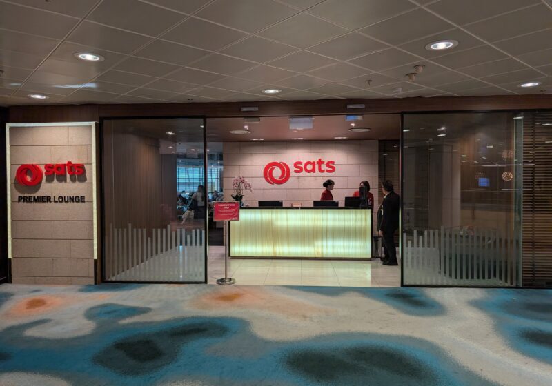 Entrance and reception desk at the SATS Premier Lounge in Changi Terminal 2