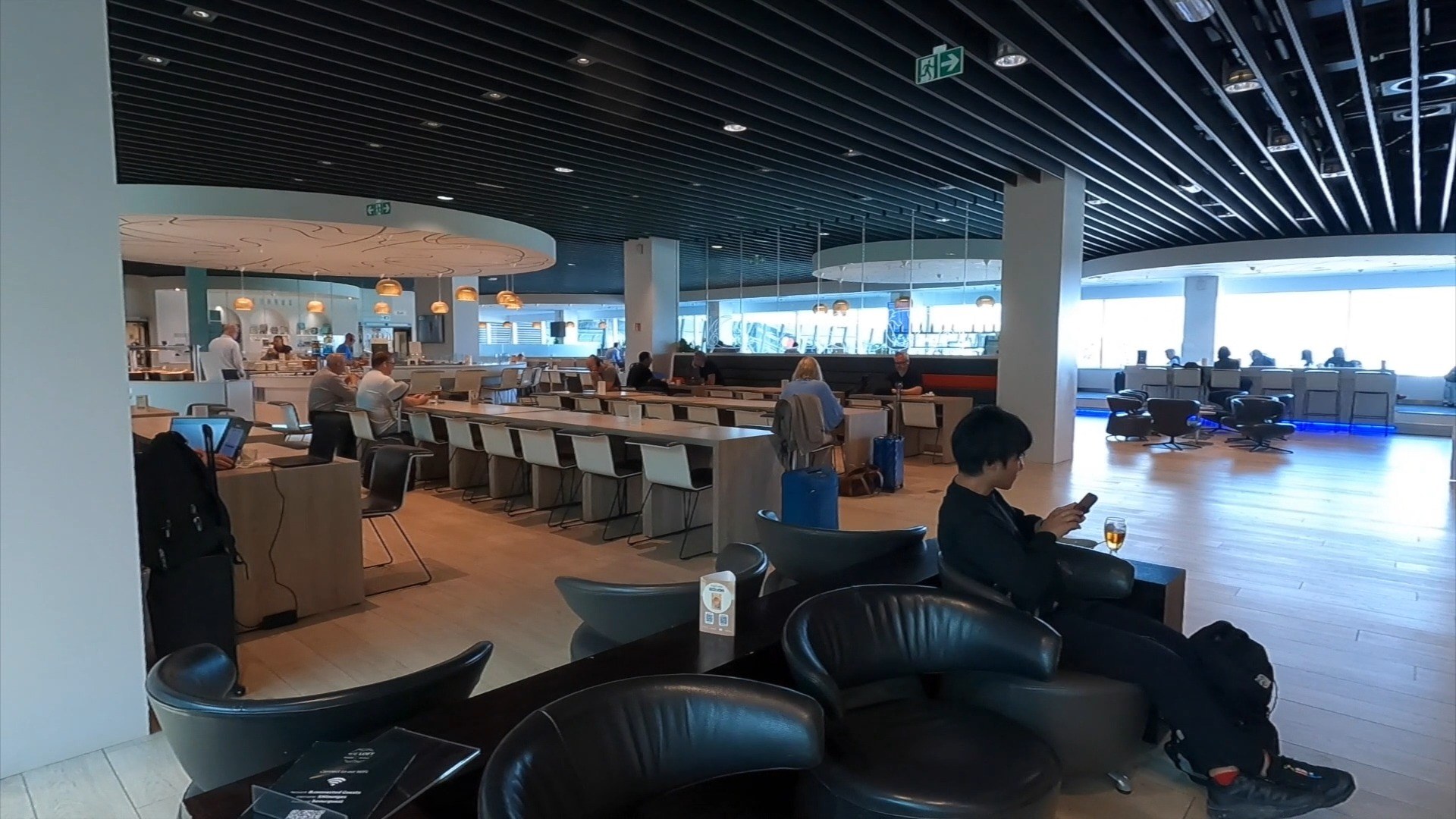 Communal tables and bar seating at The Loft