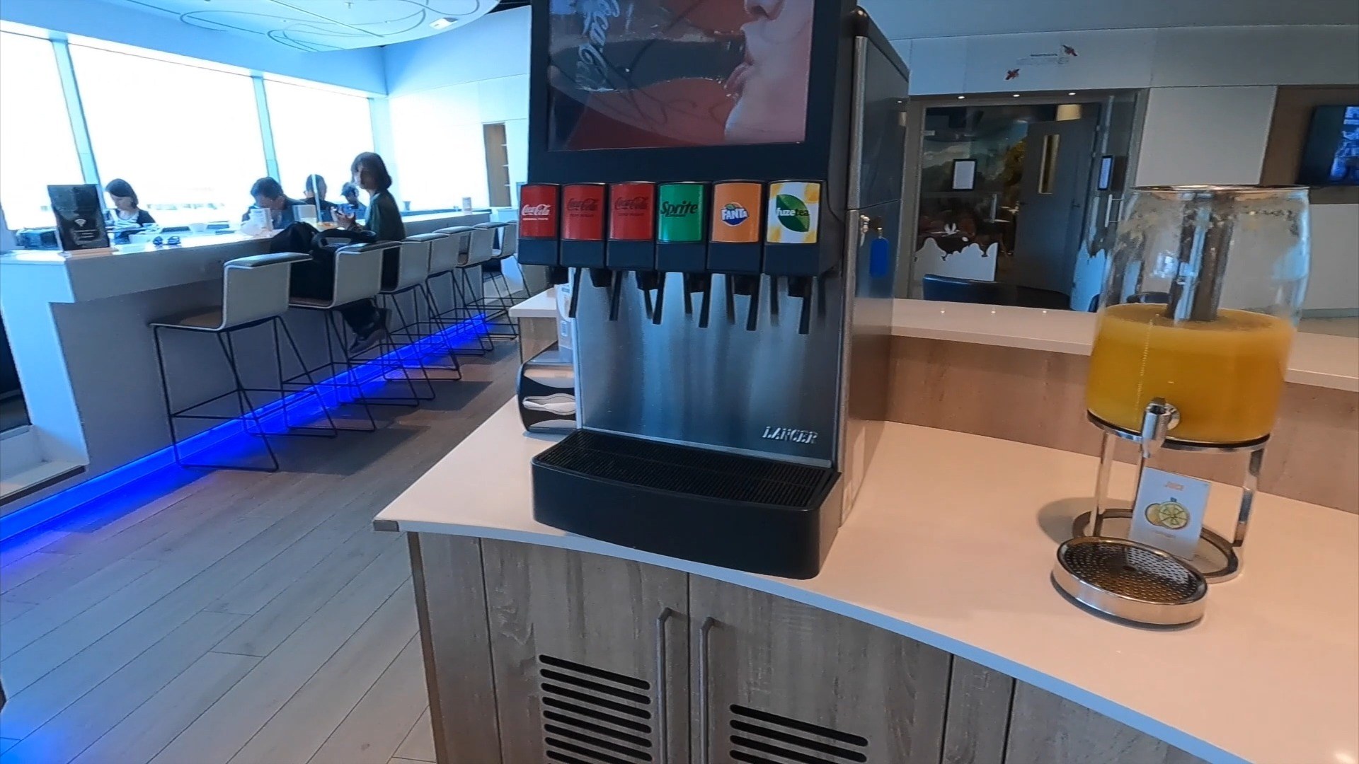 Self serve soda fountain and orange juice tap at The Loft