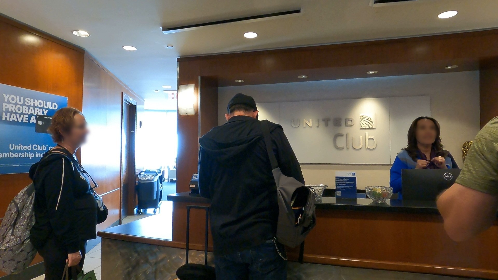Reception desk and check-in counter inside the United Club at Las Vegas Harry Reid International