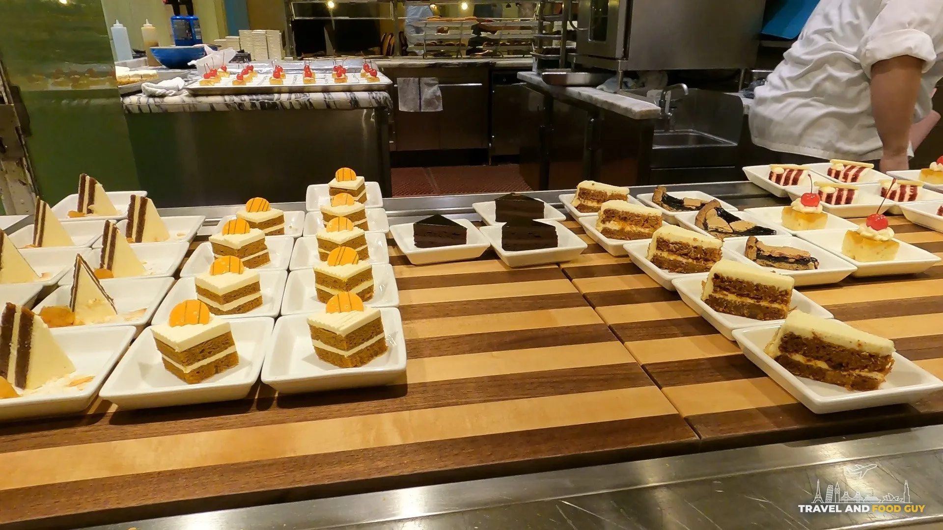 Slices of carrot cake, chocolate cake, and other cake squares at The Buffet at Wynn dessert station