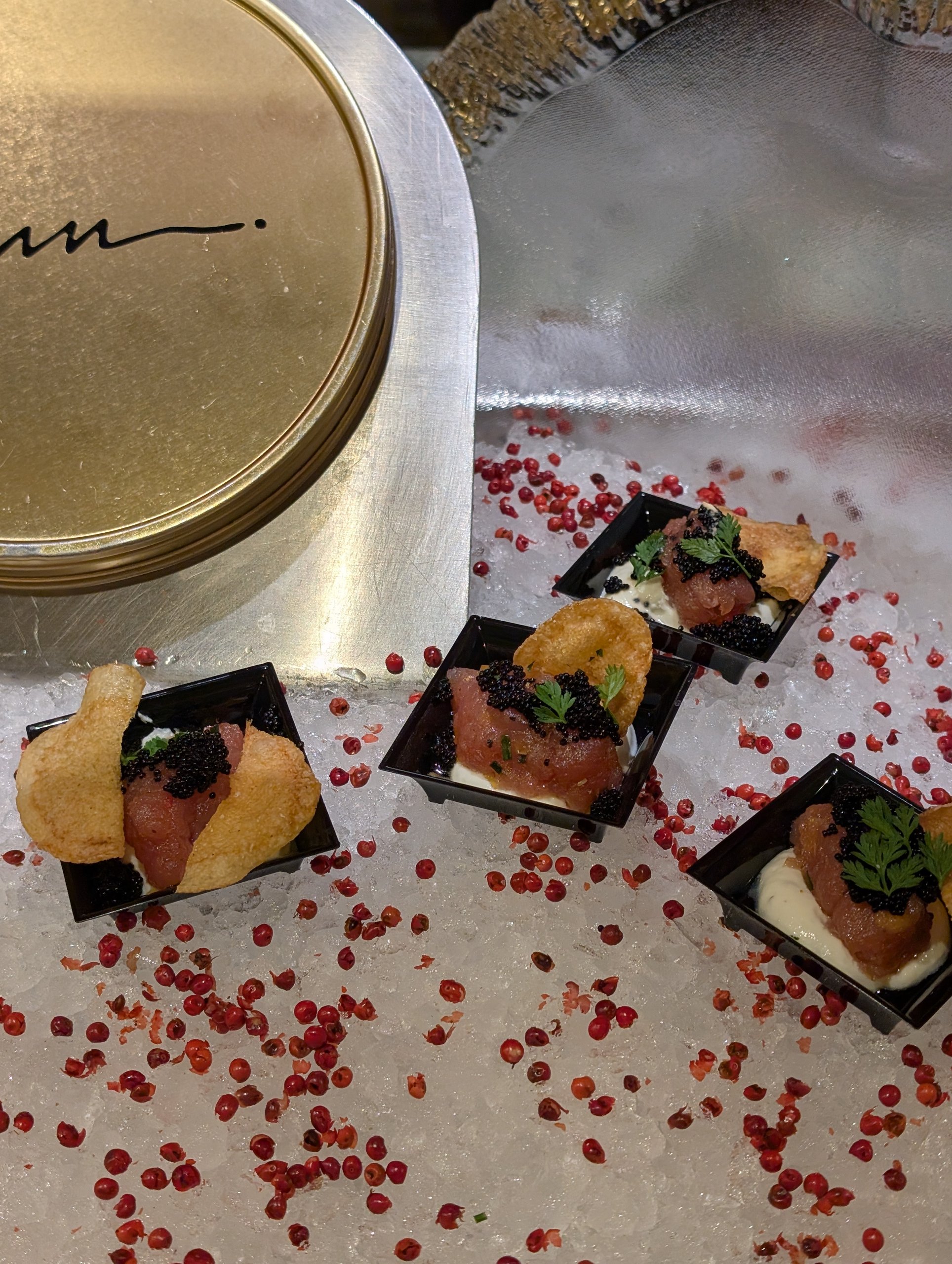 Smoked salmon canapes topped with black caviar at The Buffet at Wynn caviar bar