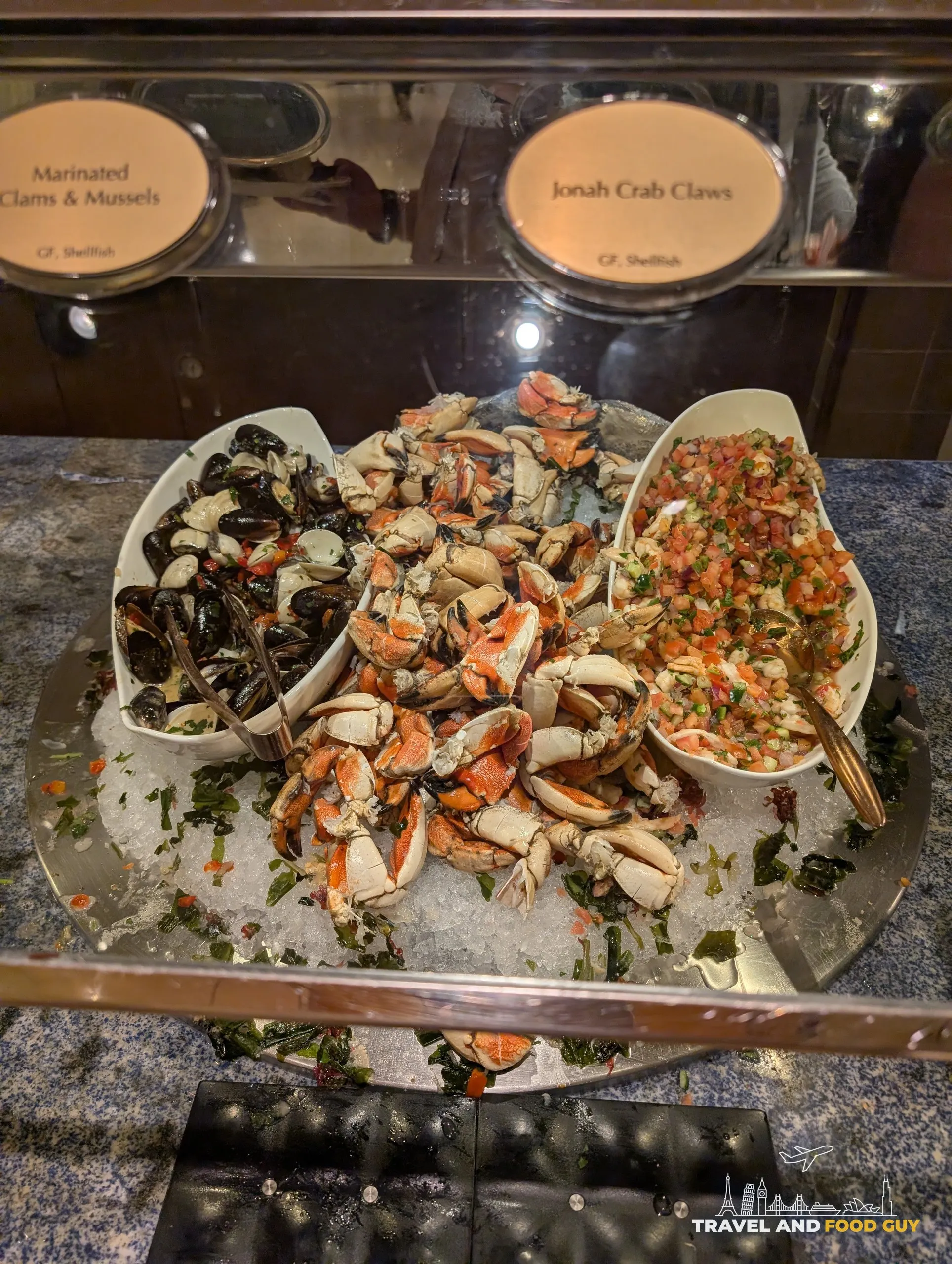 Marinated clams, mussels, and Jonah crab claws on ice at The Buffet at Wynn