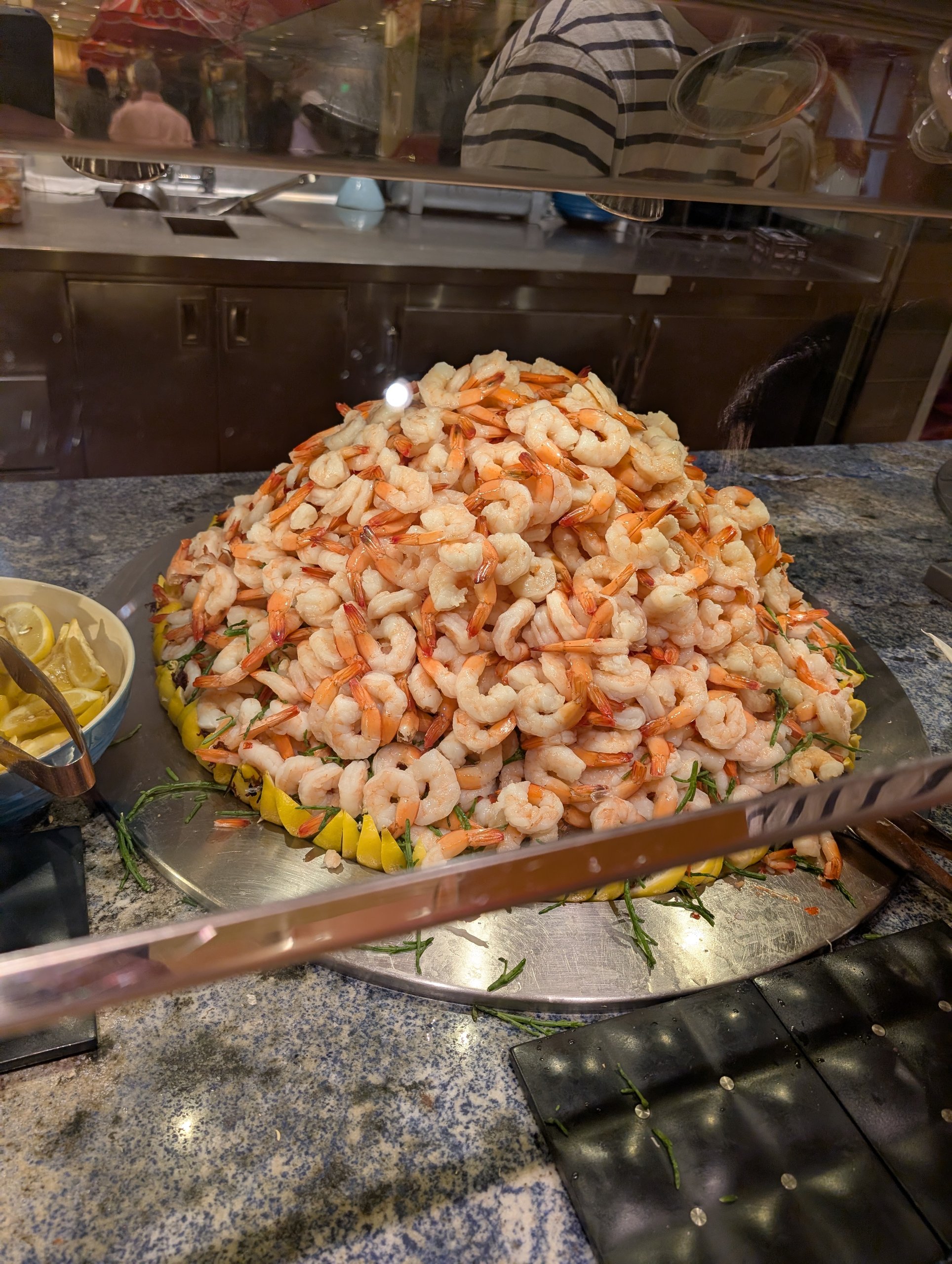 Tower of poached shrimp on ice at the cold seafood bar at The Buffet at Wynn