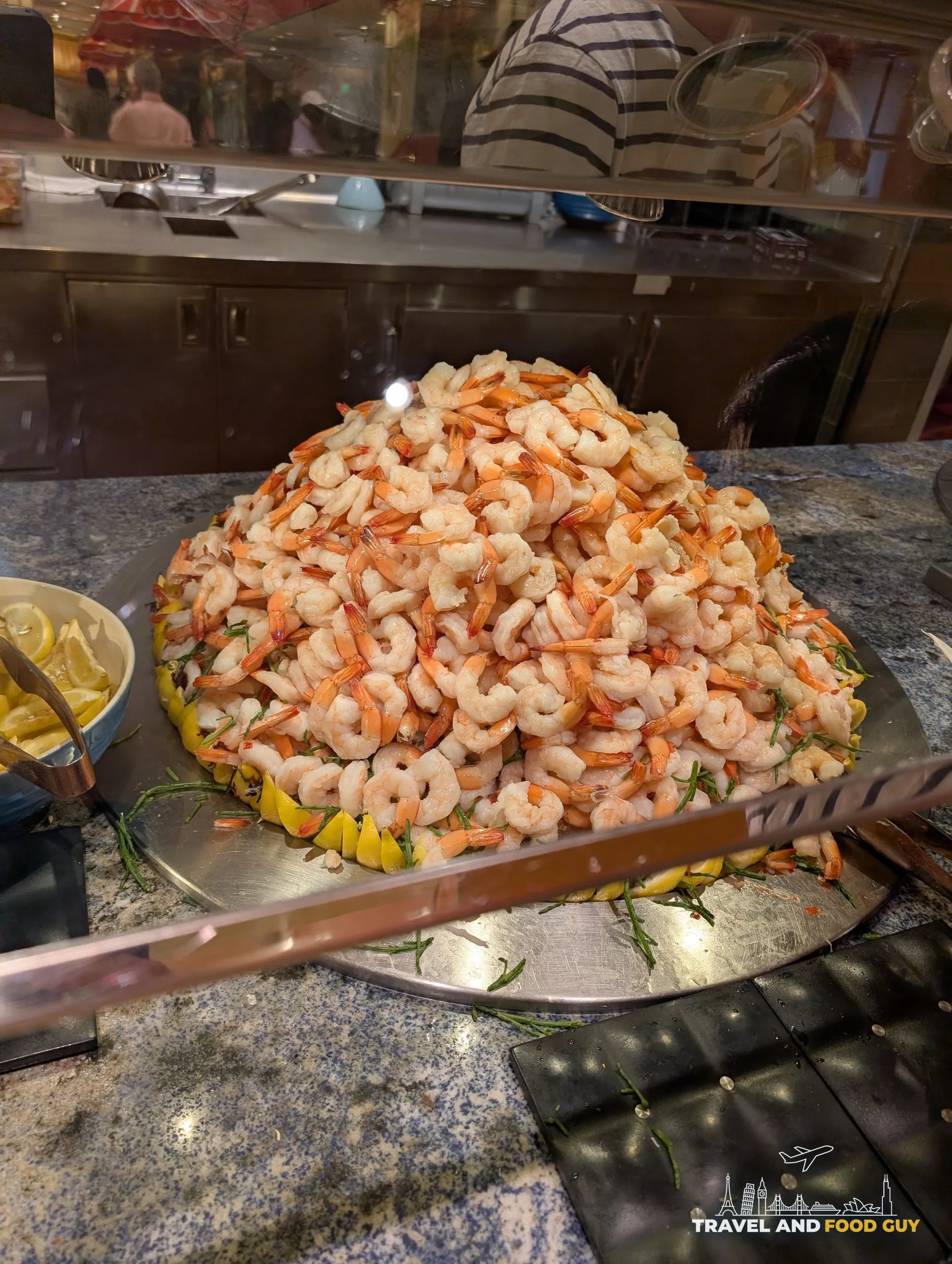 Tower of poached shrimp on ice at the cold seafood bar at The Buffet at Wynn