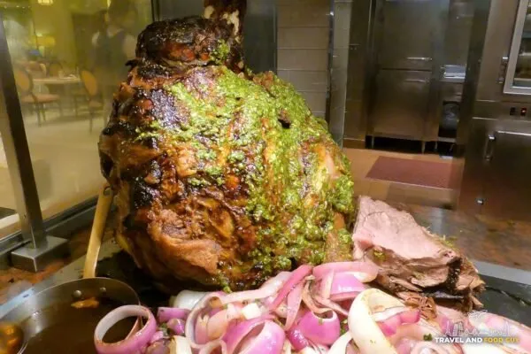 Wagyu steamship roast covered in chimichurri at the carving station of The Buffet at Wynn