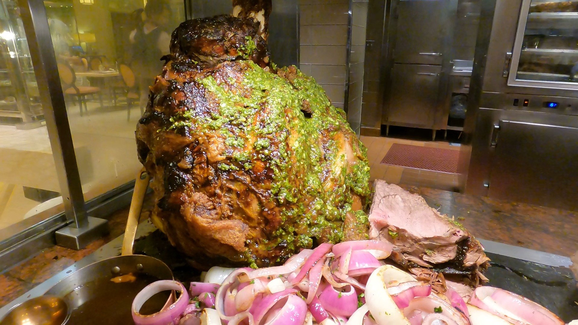 Wagyu steamship roast covered in chimichurri at the carving station of The Buffet at Wynn