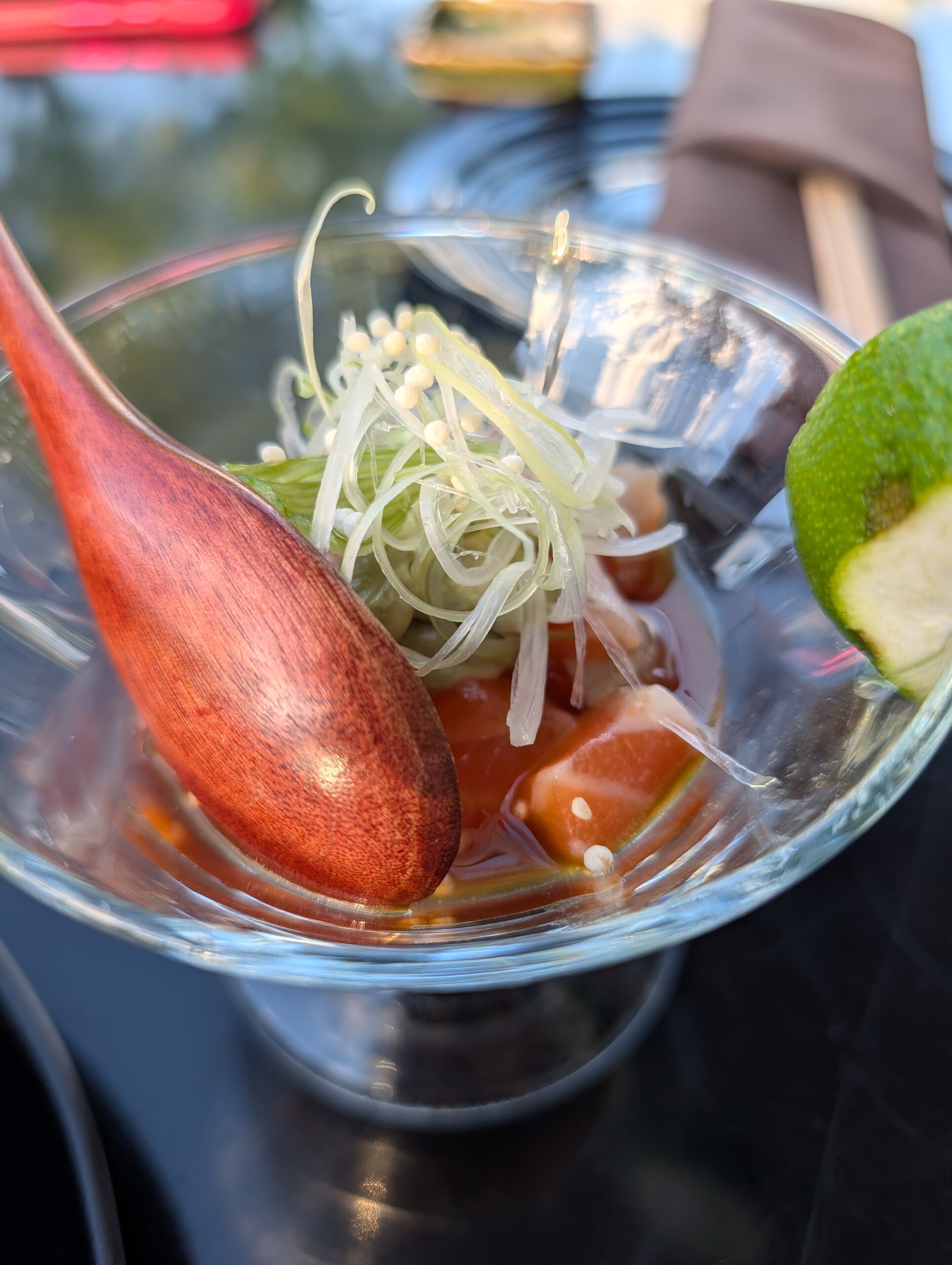 Sashimi cup at Deba Sushi Bar with salmon, ponzu, scallion and lime
