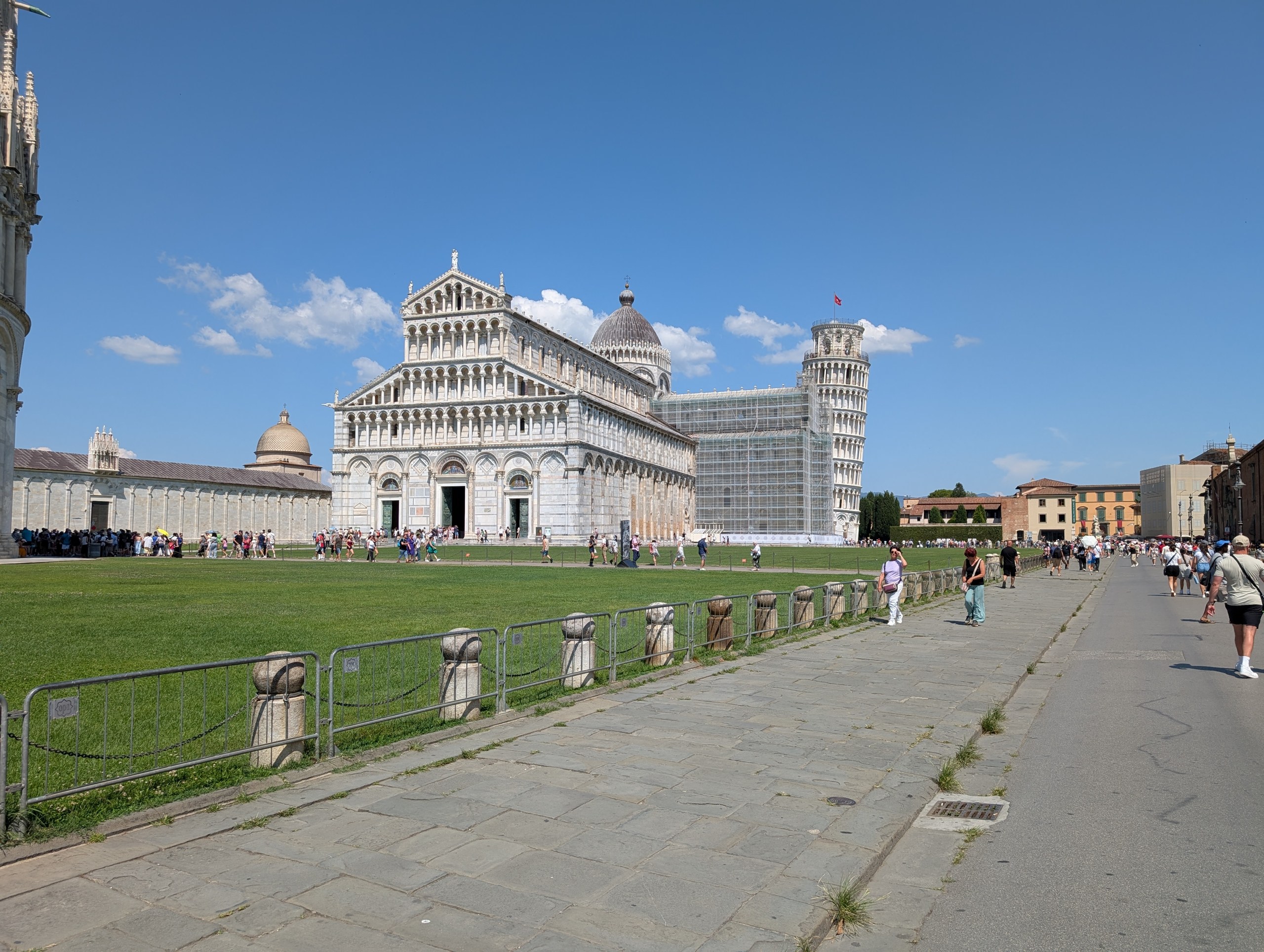 The Cathedral and Leaning Tower seen from the walkway across the Square of Miracles in Pisa