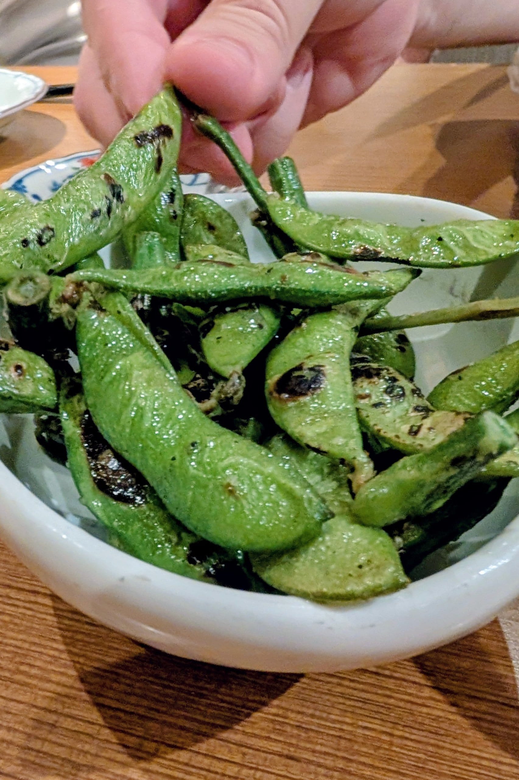 Charred edamame in the pod at Hanashizuku Singapore