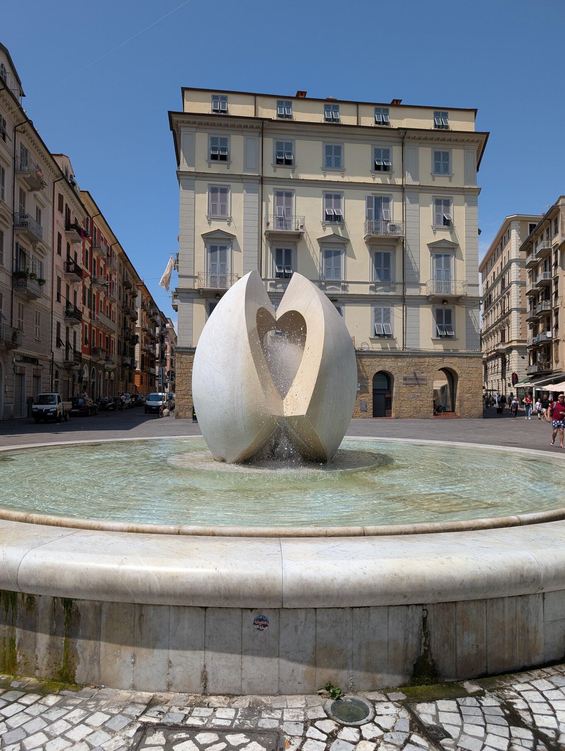 Heart sculpture fountain in a La Spezia piazza