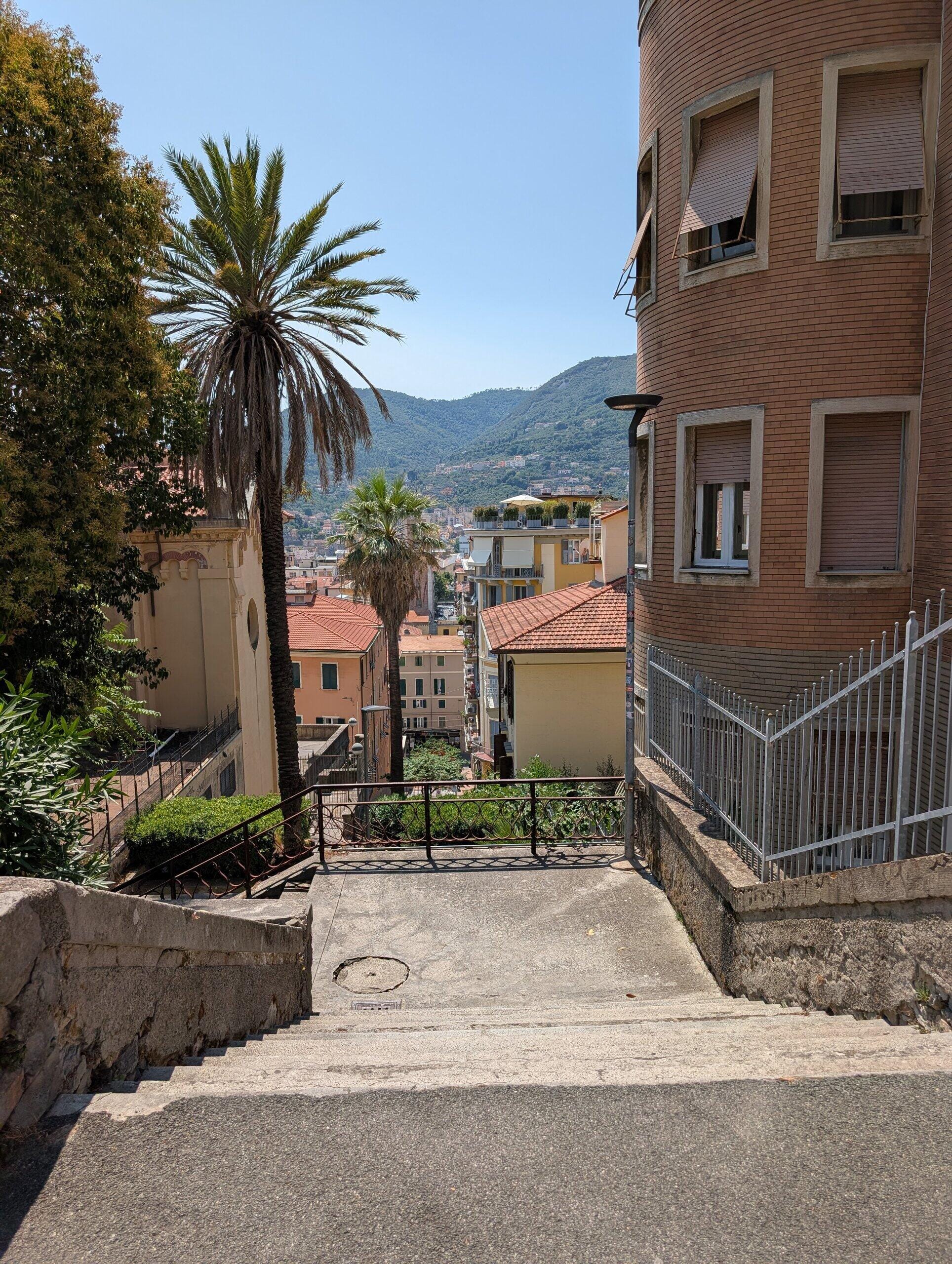 Stairs down through the La Spezia hills with rooftop views