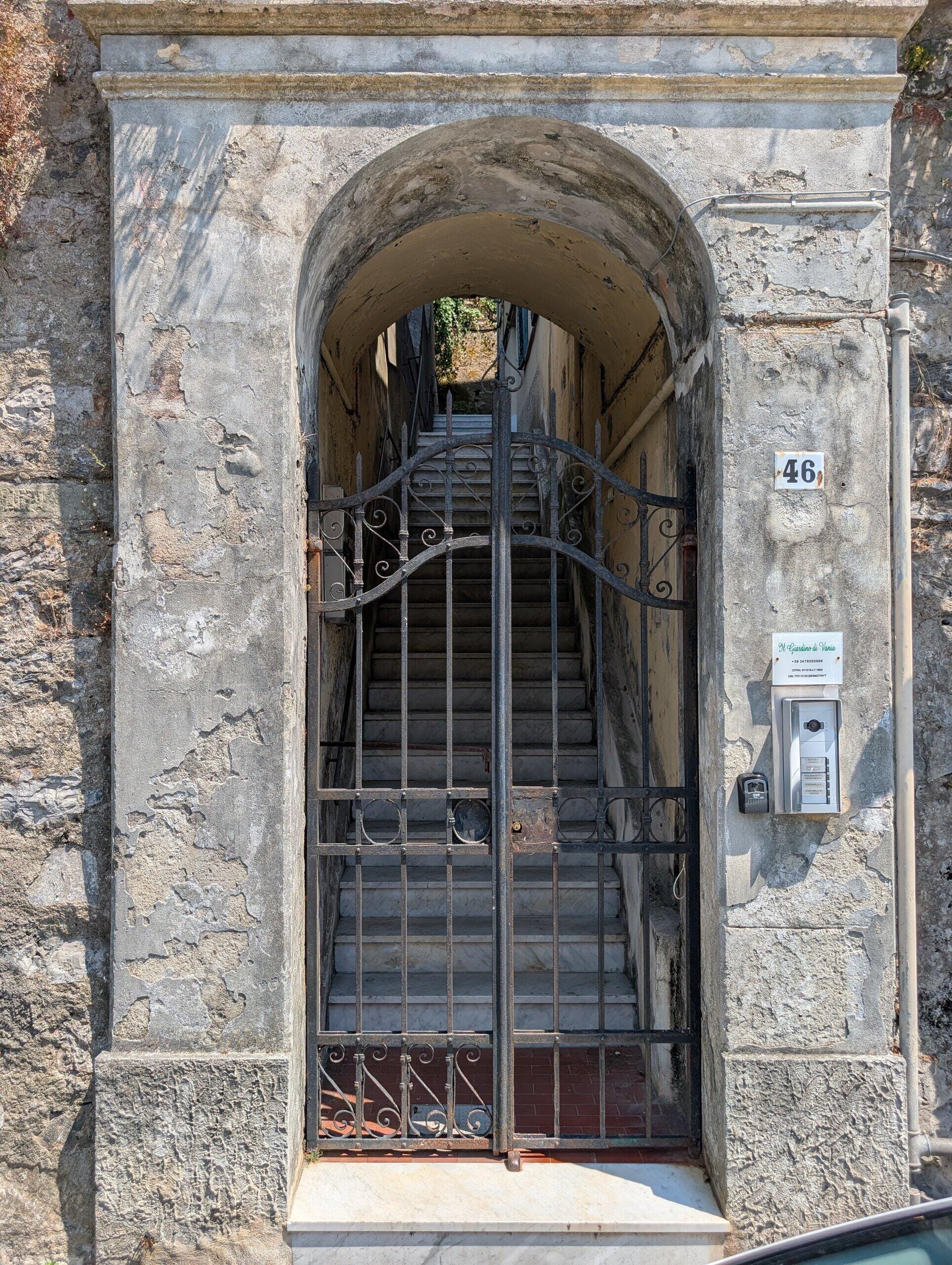 Old stone archway and staircase in the La Spezia hills