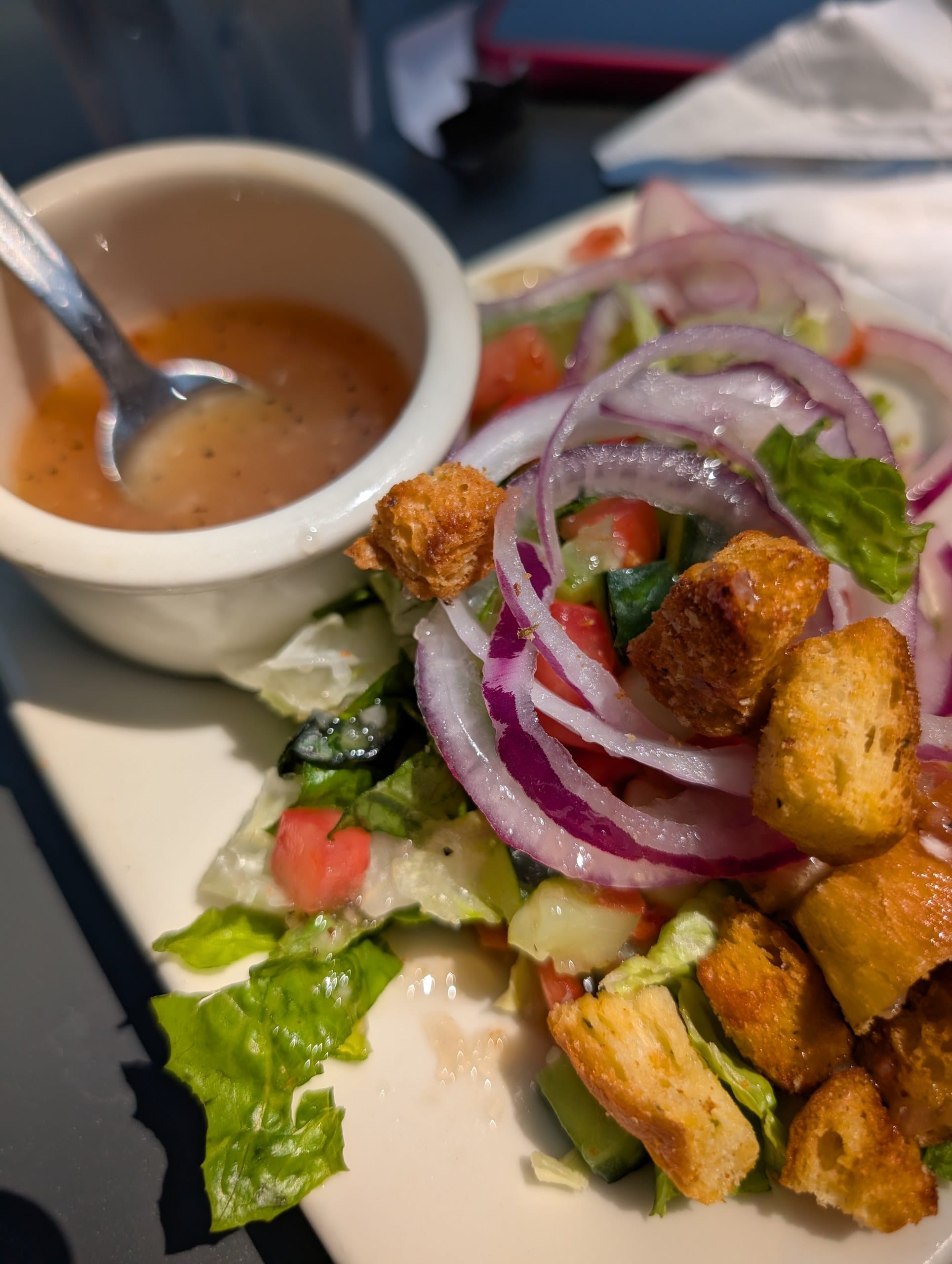 House salad with red onions, croutons, and Malnati's sweet vinaigrette at Lou Malnati's Buffalo Grove