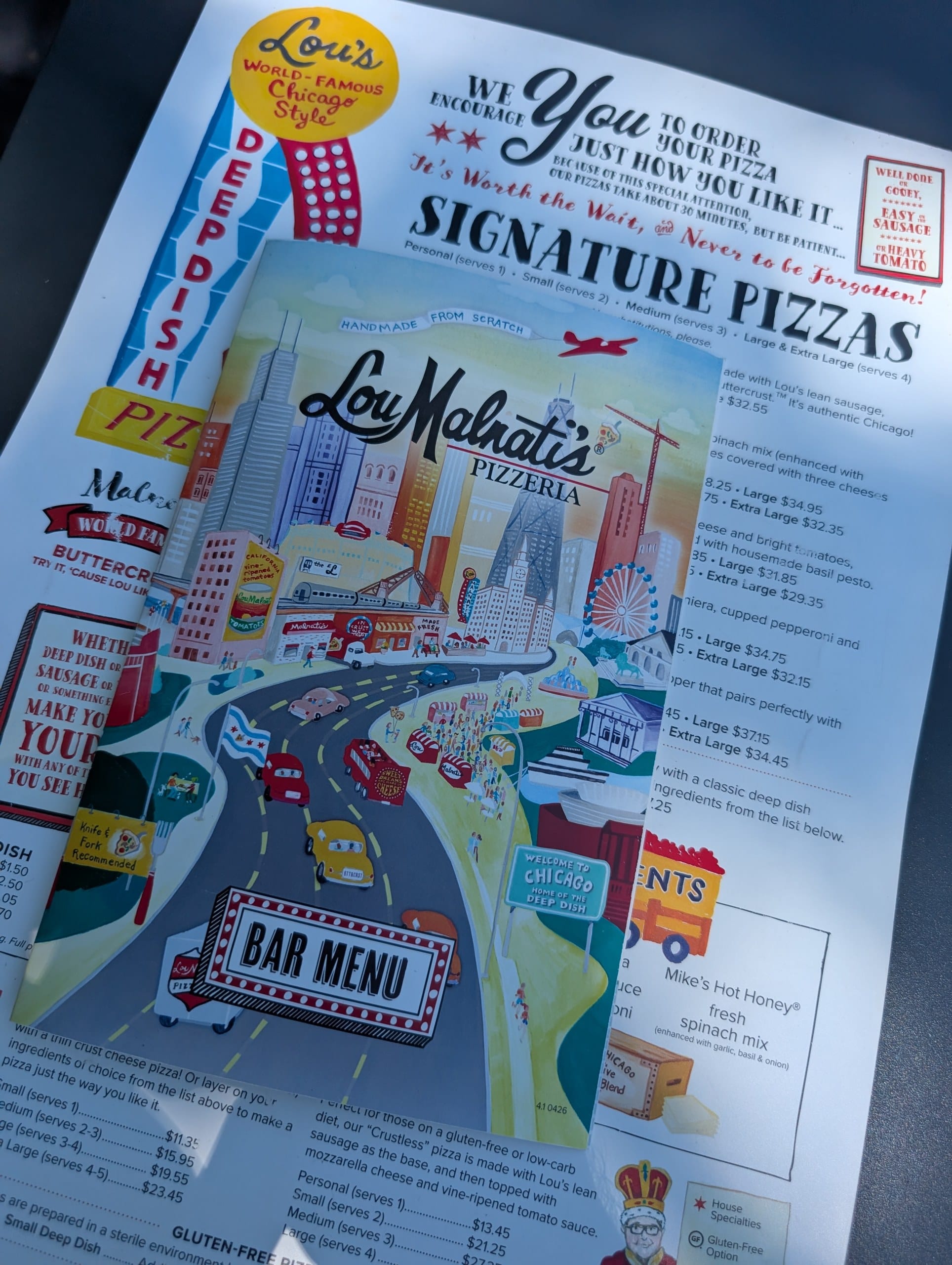 Lou Malnati's Buffalo Grove menu showing the signature pizzas and bar menu