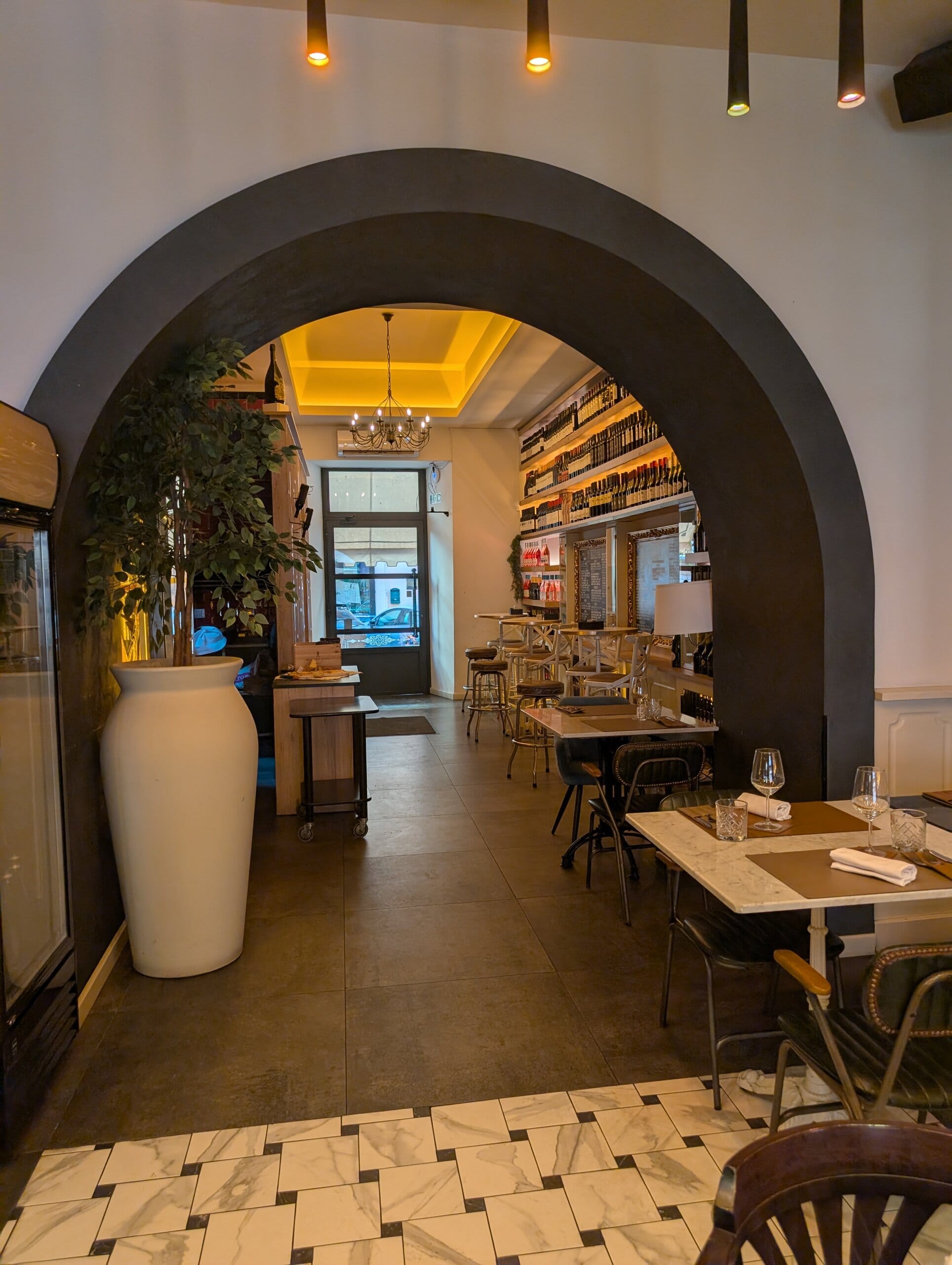 Archway connecting the dining room to the wine bar room at Mylord in Civitavecchia