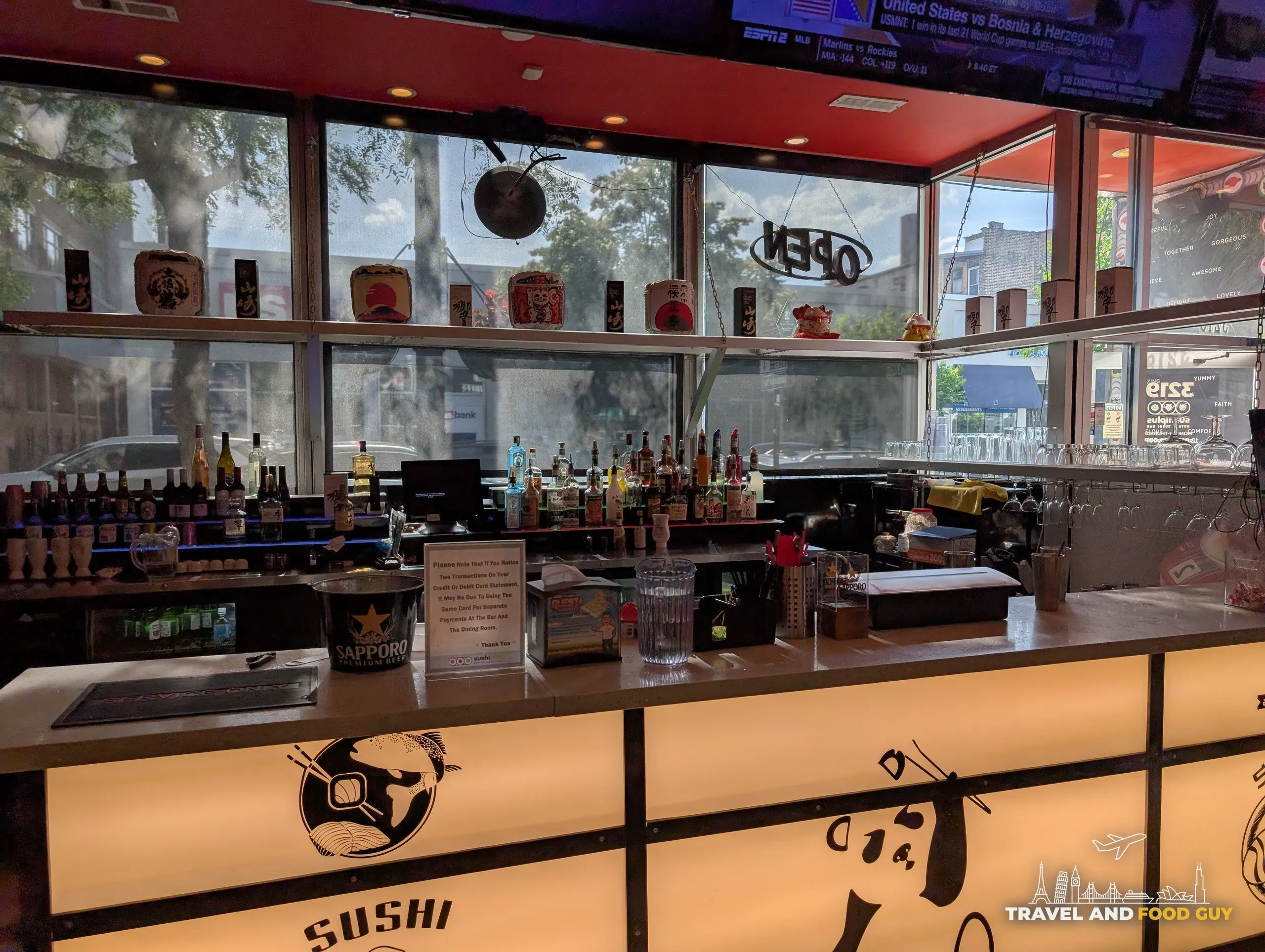 The bar at Sushi Plus with Japanese whisky on the back shelf