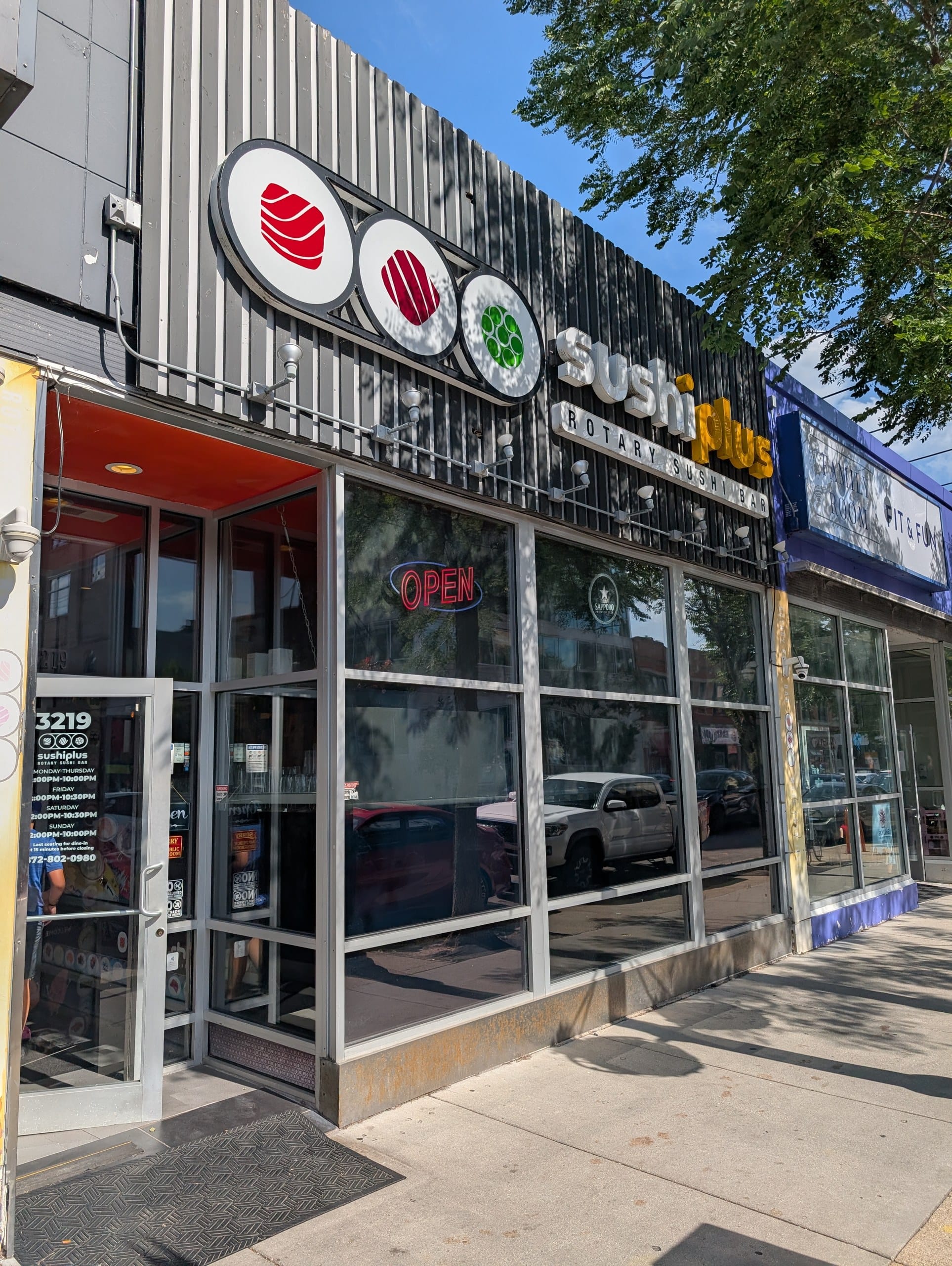 Sushi Plus Rotary Sushi Bar exterior on North Broadway in Boystown, Chicago