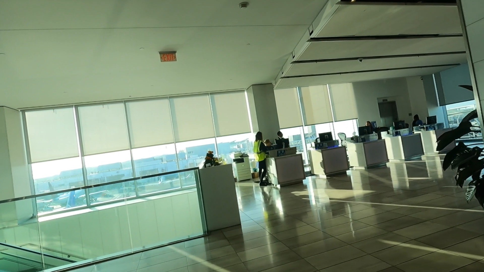 Customer service desks inside the United Club LAX