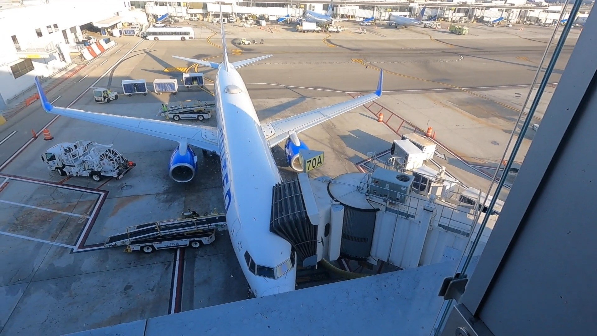 United jet parked at Gate 70A seen from the United Club LAX windows