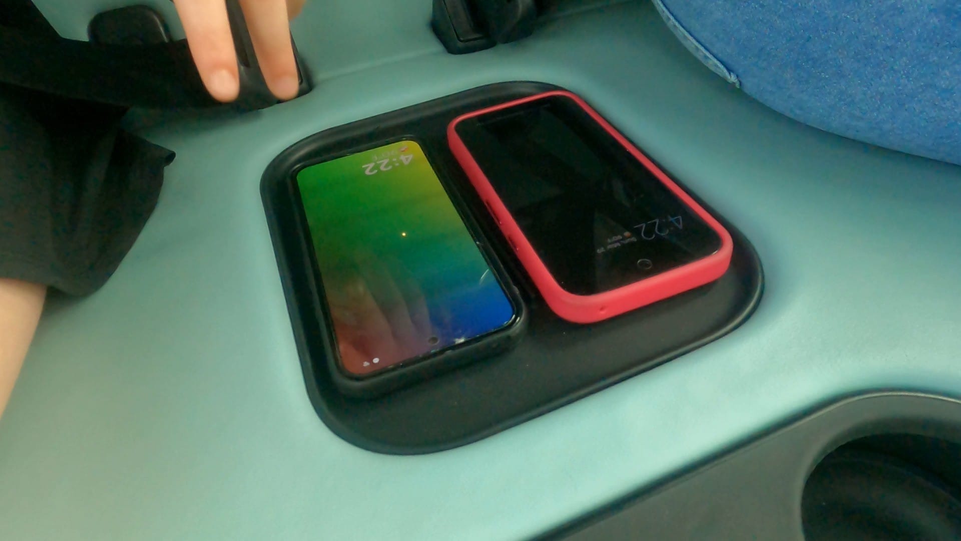 Phone charging trays inside a Zoox robotaxi