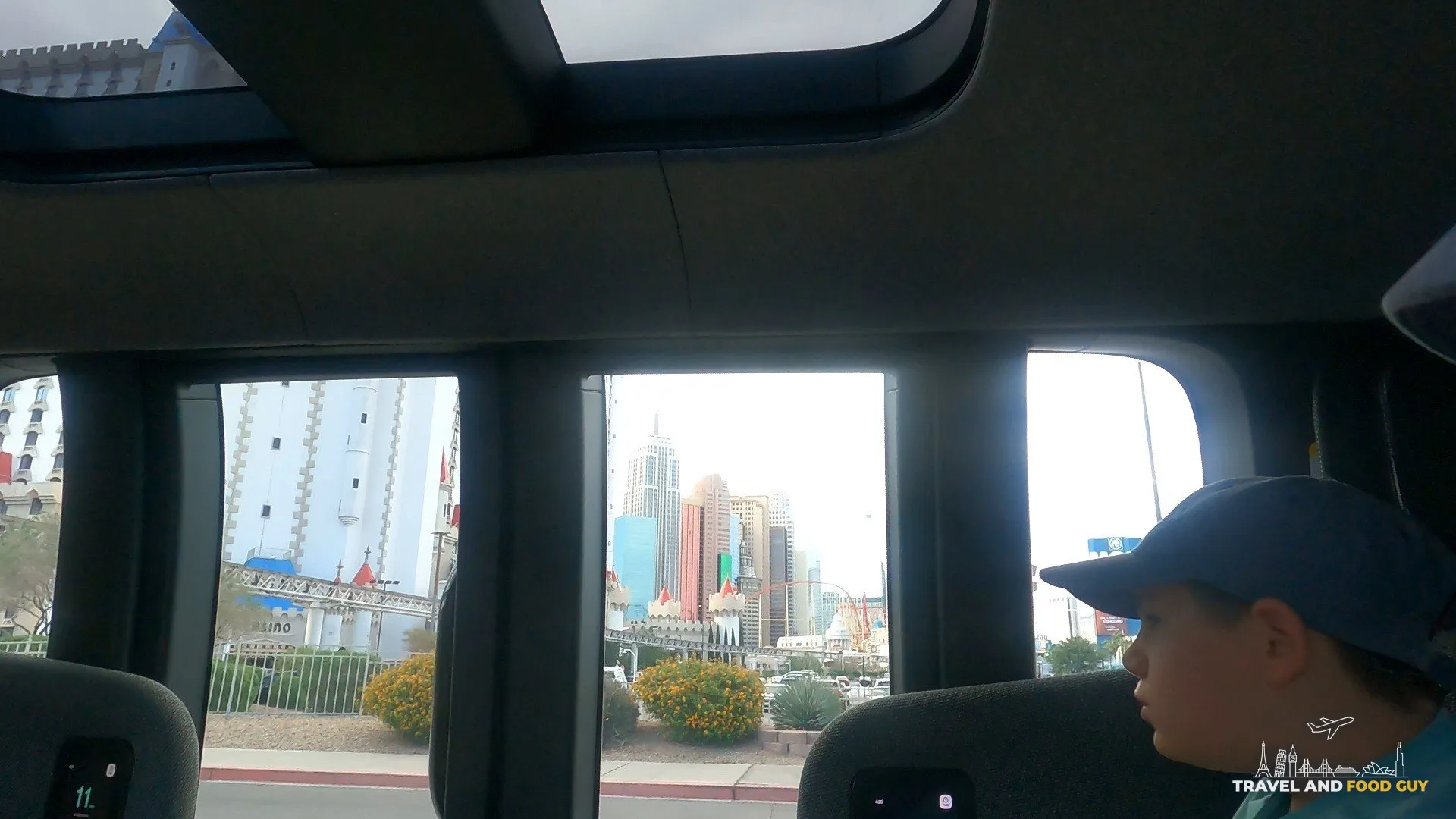 Inside a Zoox robotaxi with the Las Vegas Strip out the window