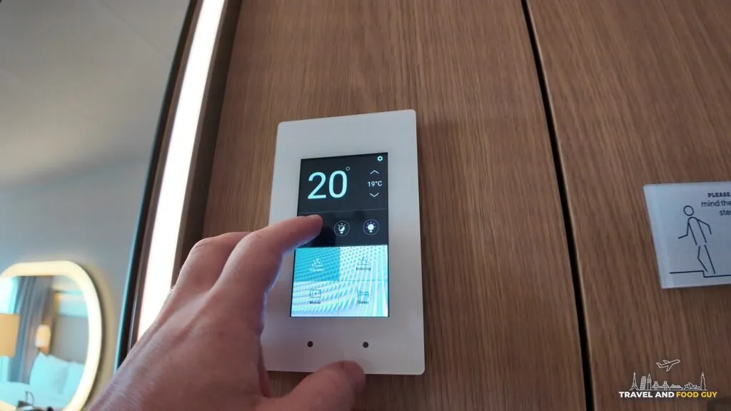 Cabin thermostat and lighting presets panel in a Legend of the Seas stateroom