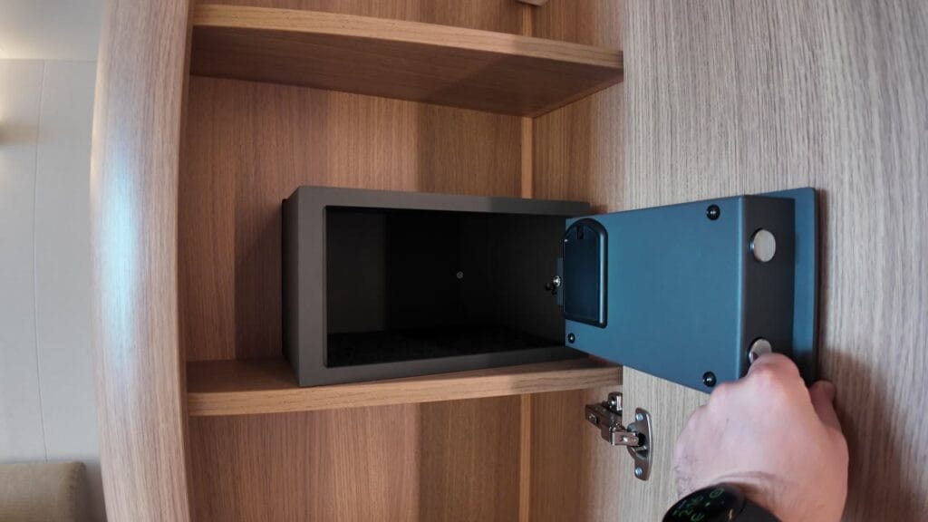 The in-room safe in a Legend of the Seas ocean view balcony stateroom, open