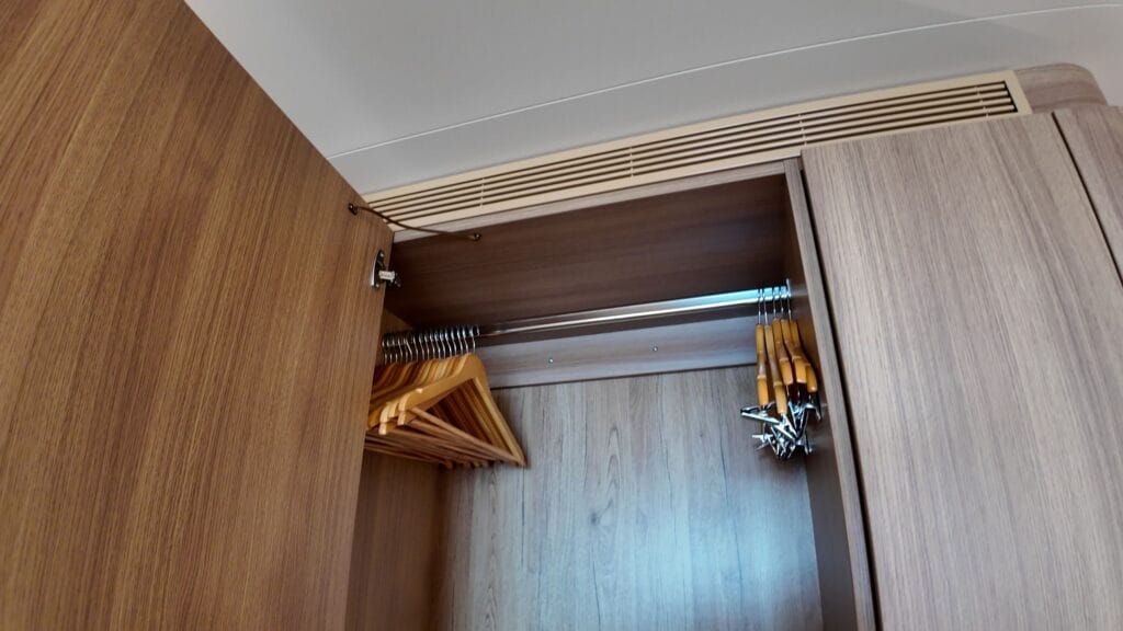 Closet and hangers in Legend of the Seas stateroom 14632
