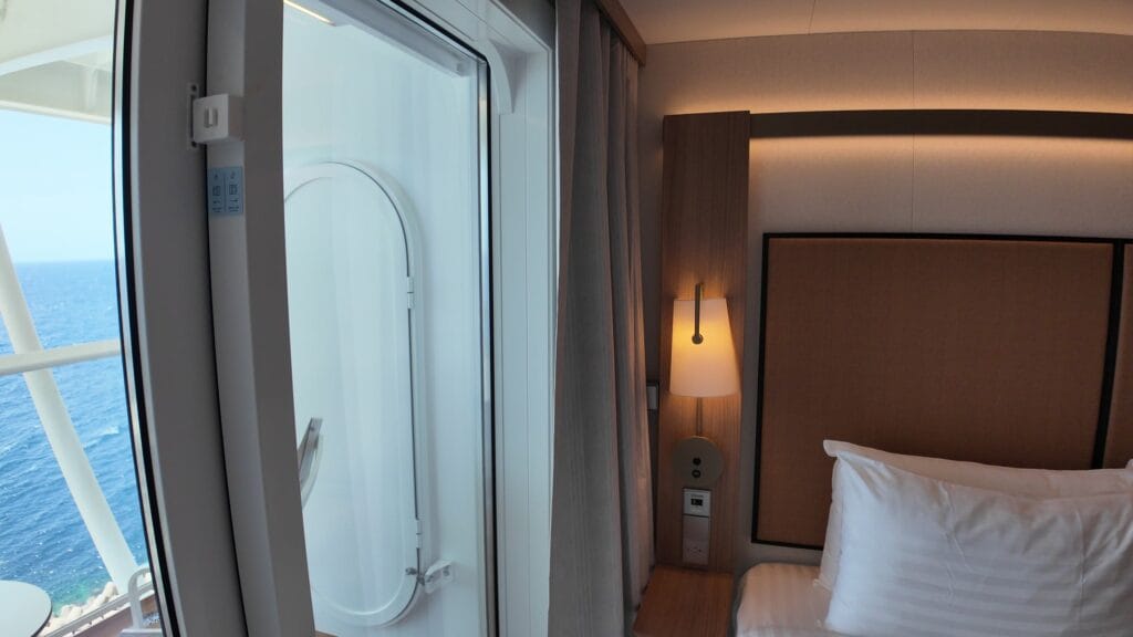 Blackout curtains beside the balcony door in stateroom 14632